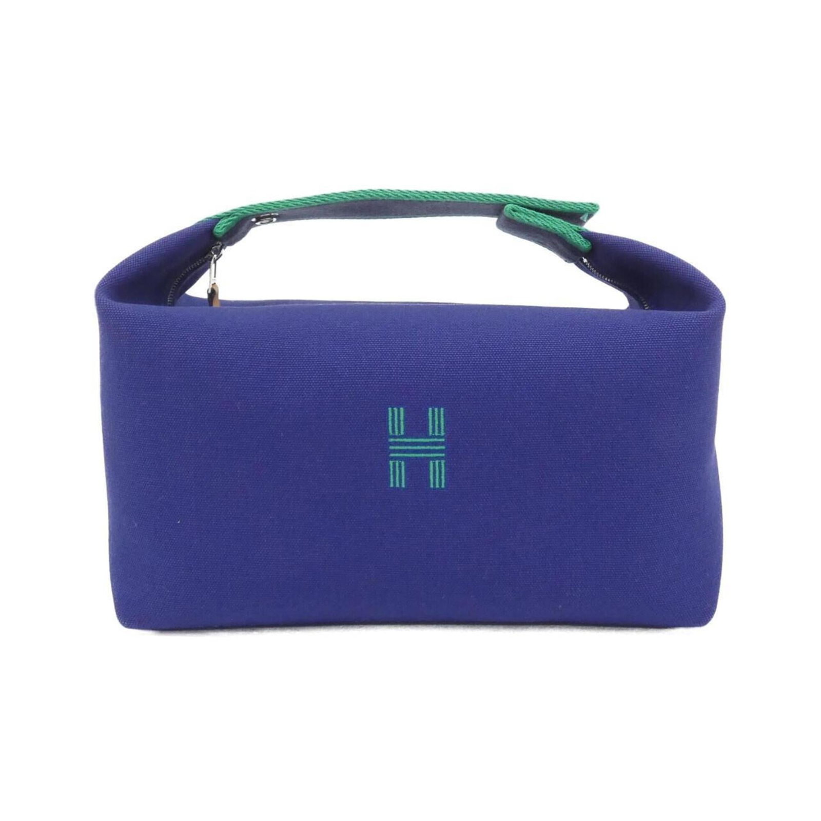 Hermes Handbag Canvas Pouch: Hermes Handbag Canvas Pouch A rare opportunity to own a pre-loved Hermes canvas pouch, perfect for adding a touch of timeless elegance to your daily essentials. This beautiful blue canvas bag boasts t