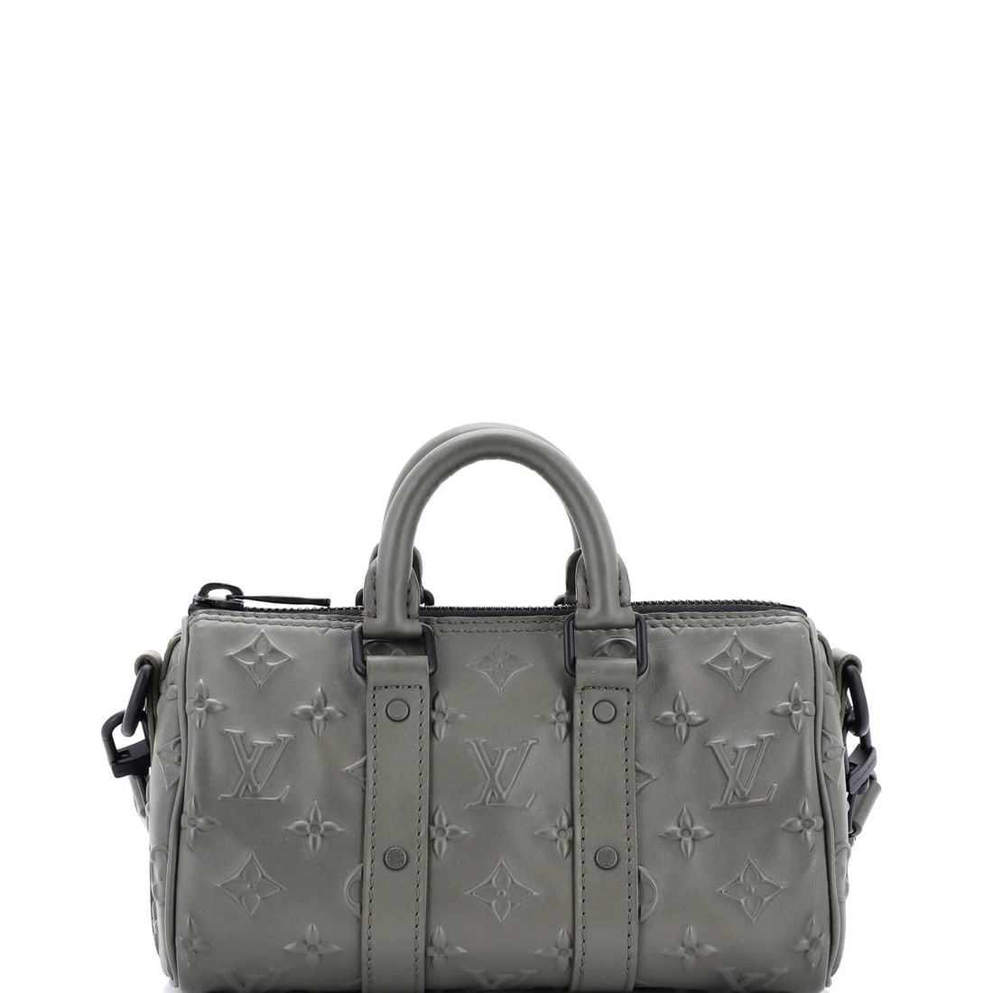 Louis Vuitton Keepall Bandouliere Bag Monogram Seal Leather XS: Louis Vuitton Keepall Bandouliere Bag Monogram Seal Leather XS A rare opportunity to own a luxurious Louis Vuitton Keepall Bandouliere Bag, boasting the iconic monogram seal and exceptional