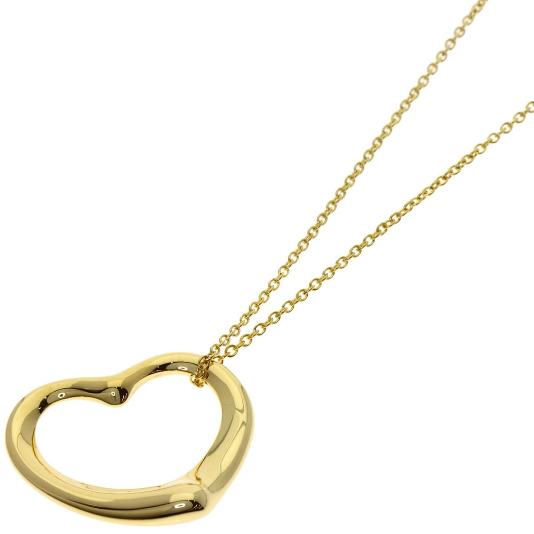 Tiffany and Co open heart necklace of gold yellow.: Tiffany and Co open heart necklace of gold yellow. Elegance and sophistication come together in this stunning Tiffany & Co open heart necklace, crafted from 18k K18 yellow gold that shines with a