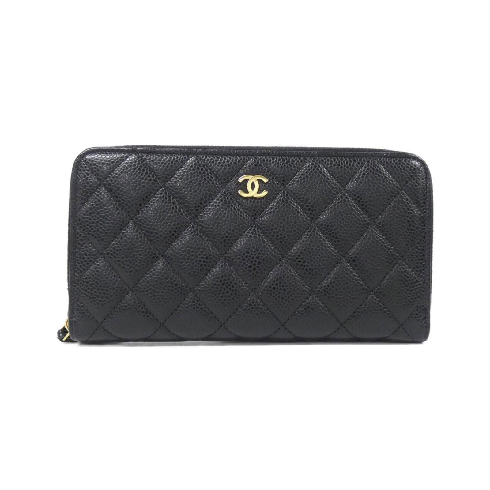 Chanel Grained Calfskin Bi Fold Wallet: Chanel Grained Calfskin Bi Fold Wallet A timeless piece from the iconic Chanel brand, this bi-fold wallet boasts sleek, grained calfskin and a classic design that exudes sophistication. With its