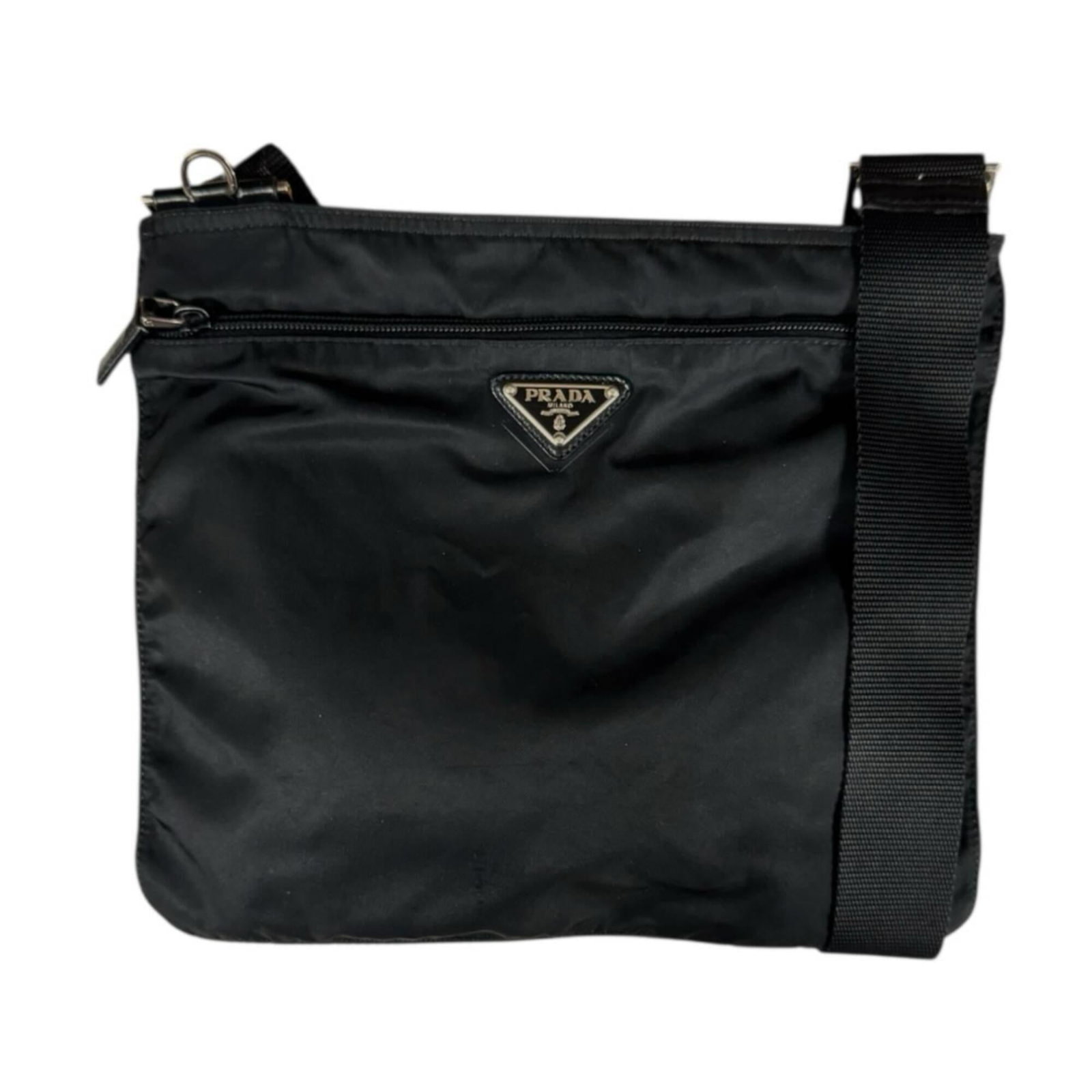 Prada nylon shoulder bag: Prada nylon shoulder bag A sleek and versatile Prada nylon shoulder bag, perfect for everyday use, boasts a sturdy zipper closure, multiple zippered pockets for organization, and adjustable straps tha