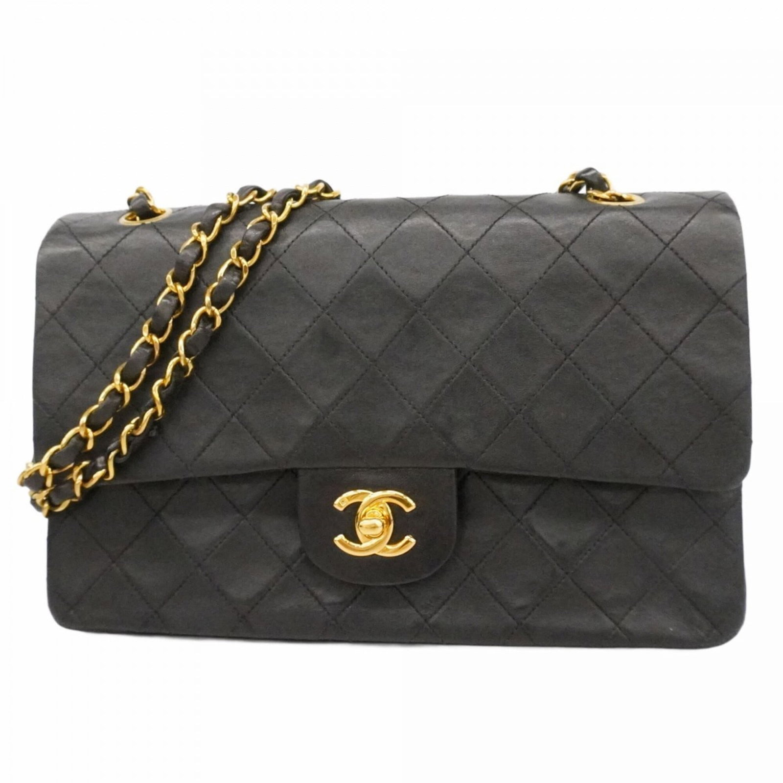 Chanel Leather Shoulder Bag: Chanel Leather Shoulder Bag A sleek and sophisticated Chanel leather shoulder bag, crafted from luxurious lambskin in rich black, adorned with elegant gold hardware. With its classic design and