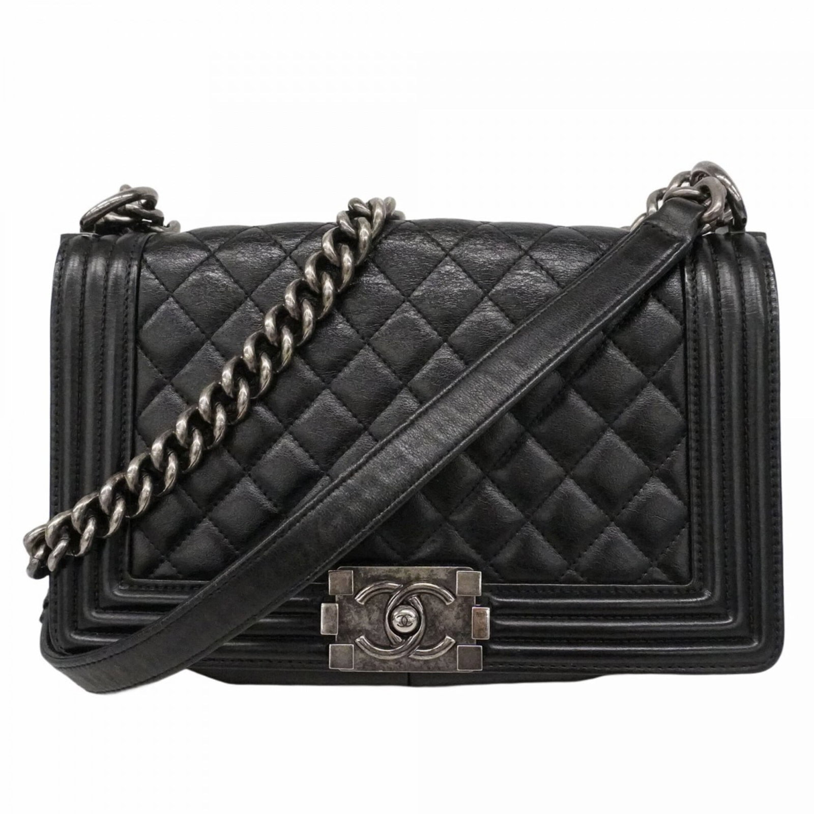 Chanel Leather Shoulder Bag: Chanel Leather Shoulder Bag A timeless and sophisticated Chanel leather shoulder bag, crafted from luxurious lambskin in sleek black, adds an air of elegance to any outfit. With its classic design