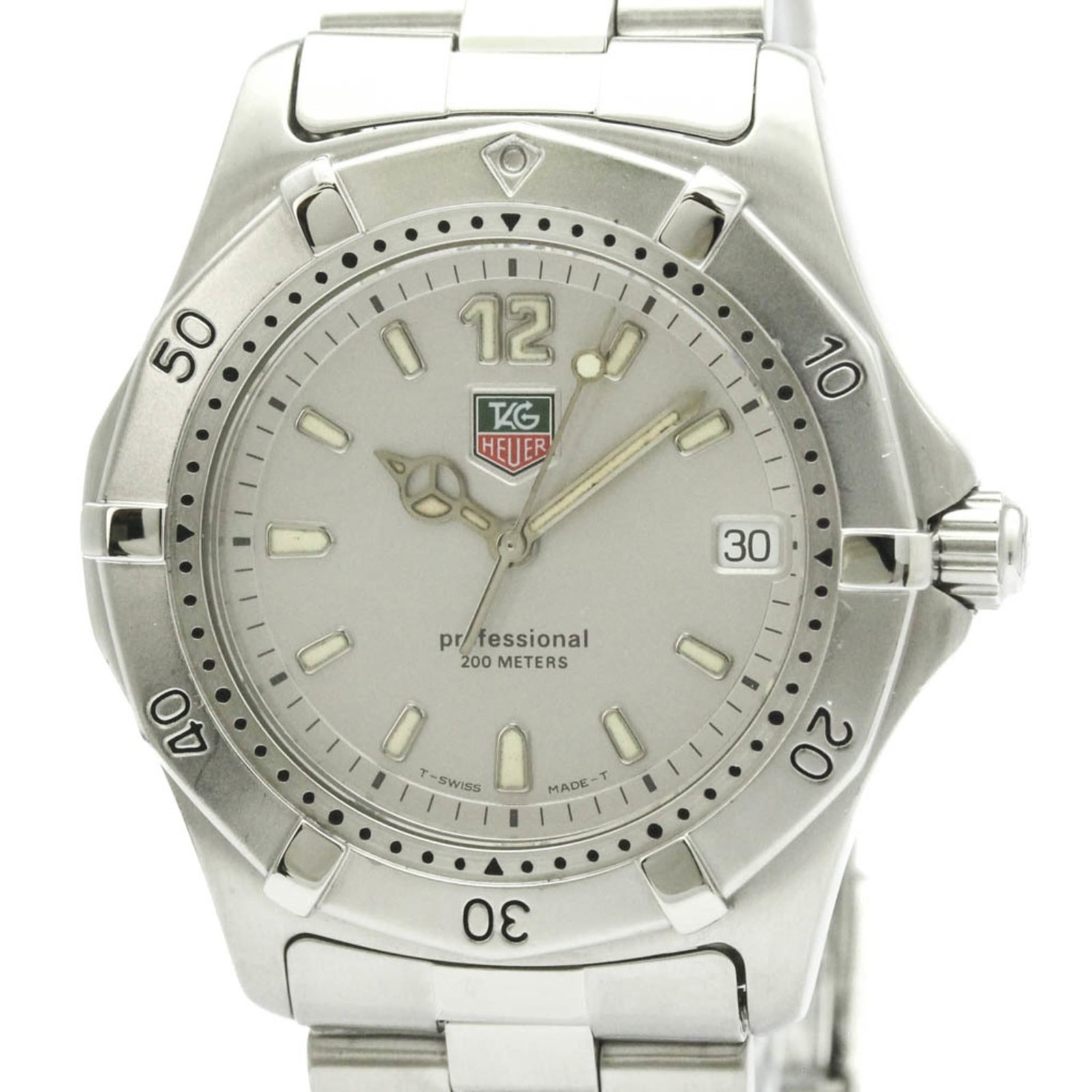 Tag Heuer Wristwatch: Tag Heuer Wristwatch A sleek and sporty Tag Heuer wristwatch, perfect for the modern man on-the-go, boasts a durable stainless steel case and band that can withstand everyday wear. With its silver
