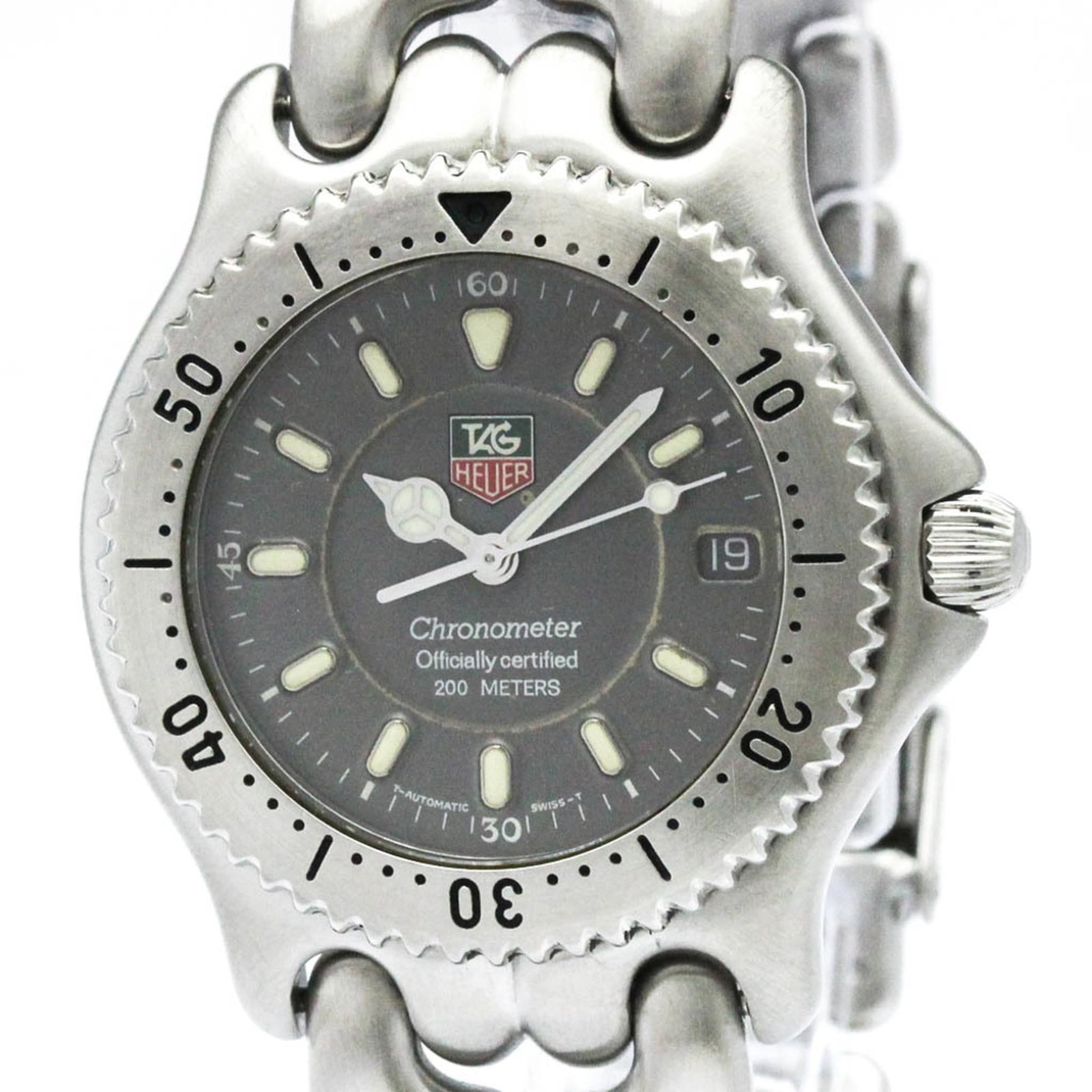 Tag Heuer Wristwatch: Tag Heuer Wristwatch A sleek and sophisticated timepiece, this Tag Heuer wristwatch boasts a classic 38mm stainless steel case and band, perfect for dressing up any formal occasion. With its durable