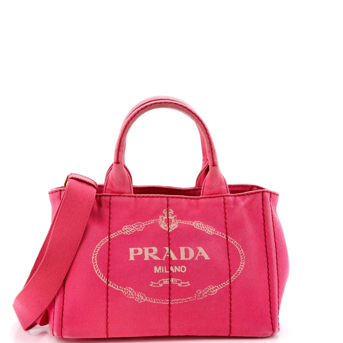 Prada Canapa Convertible Tote Canvas Mini: Prada Canapa Convertible Tote Canvas Mini The Prada Canapa Convertible Tote Canvas Mini is a stylish and versatile mini tote that boasts a chic pink canvas exterior with gold hardware accents. Its