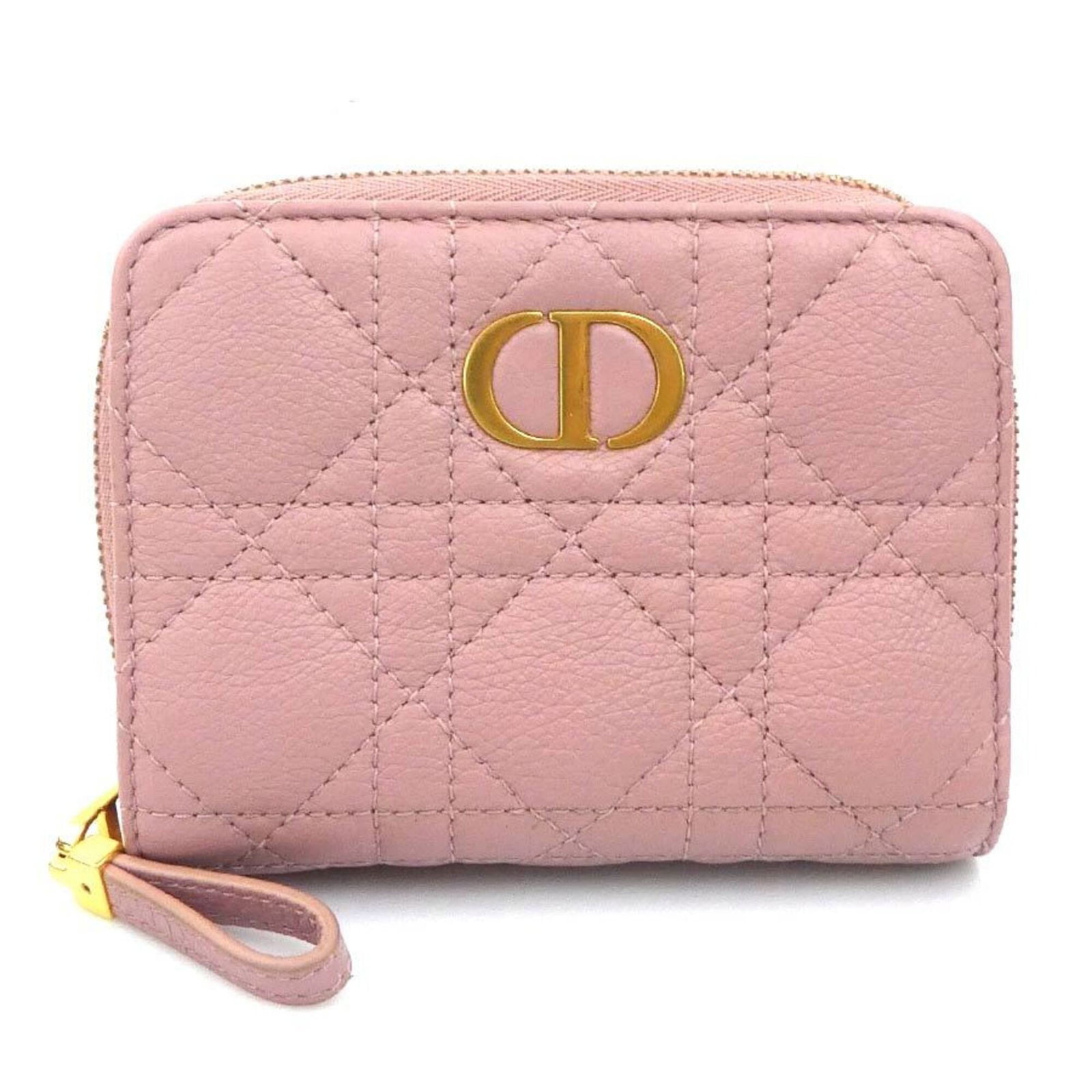 Christian Dior Bi Fold Leather Wallet: Christian Dior Bi Fold Leather Wallet A stylish and sophisticated accessory for the modern woman, this Christian Dior bi-fold leather wallet boasts a chic pink lambskin exterior that adds a touch of