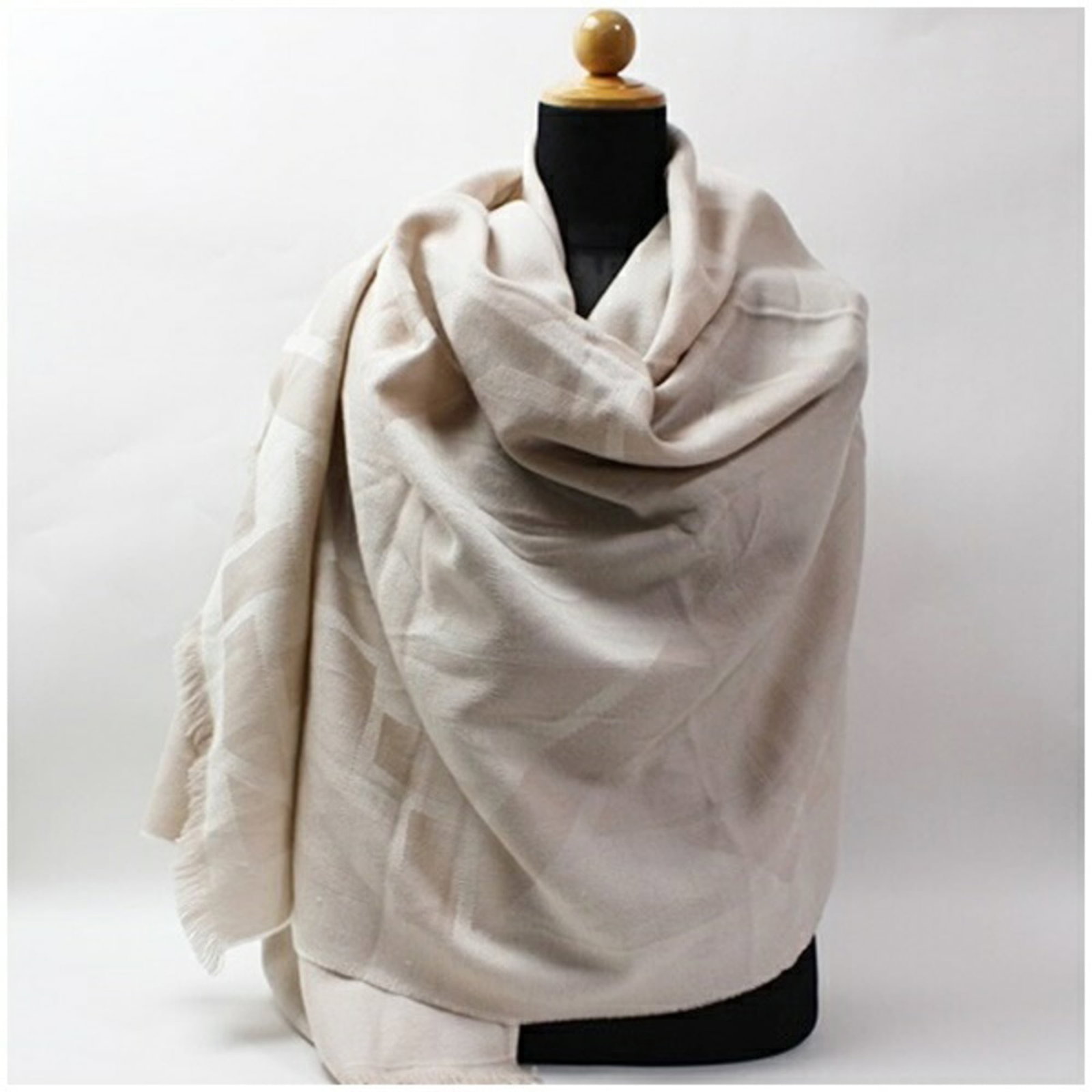 Christian Dior Stole: Christian Dior Stole A stunning Christian Dior stole in exquisite beige, perfect for adding a touch of luxury to any outfit. With its elegant 1.94m x 73cm dimensions and classic design, this piece is