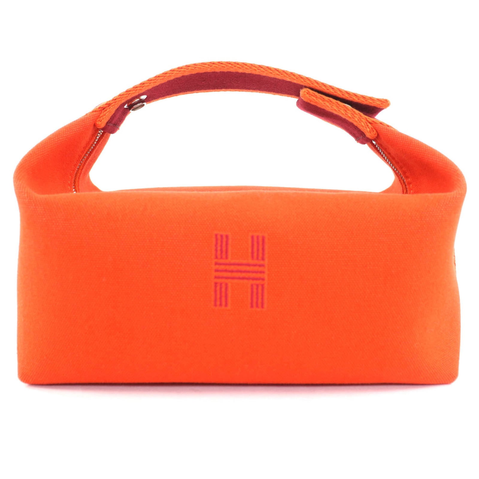 Hermes Handbag of Wool: Hermes Handbag of Wool A vibrant orange wool handbag from the iconic French brand Hermes, boasting a sleek silver zipper closure and sturdy 25cm handle. With its unique blend of natural fibers and