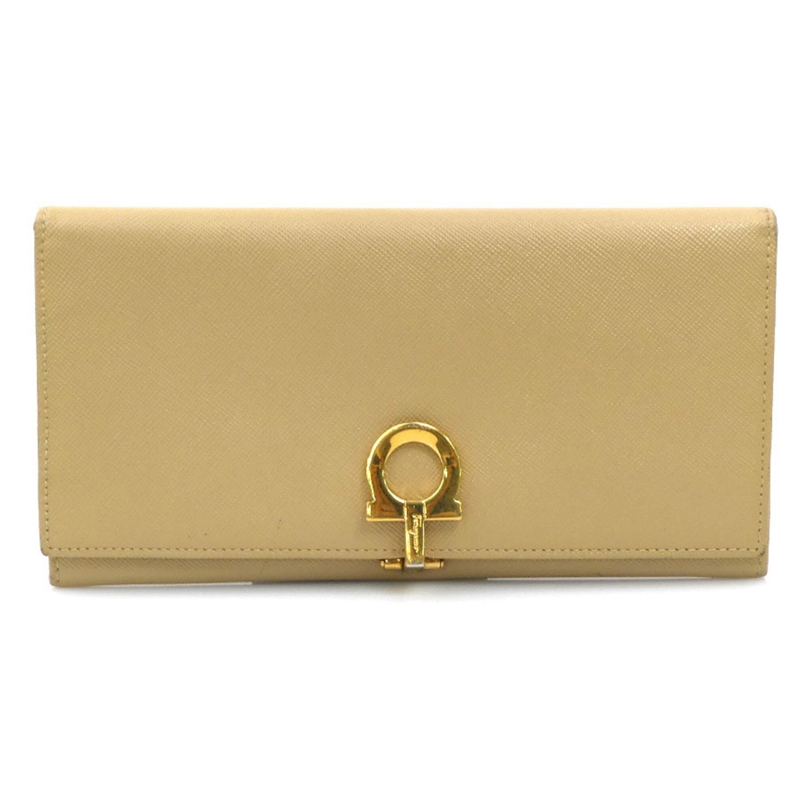 Salvatore Ferragamo Long Leather Bi-Fold Wallet: Salvatore Ferragamo Long Leather Bi-Fold Wallet A timeless Salvatore Ferragamo long leather bi-fold wallet in classic beige, perfect for adding an air of sophistication to your daily essentials. With