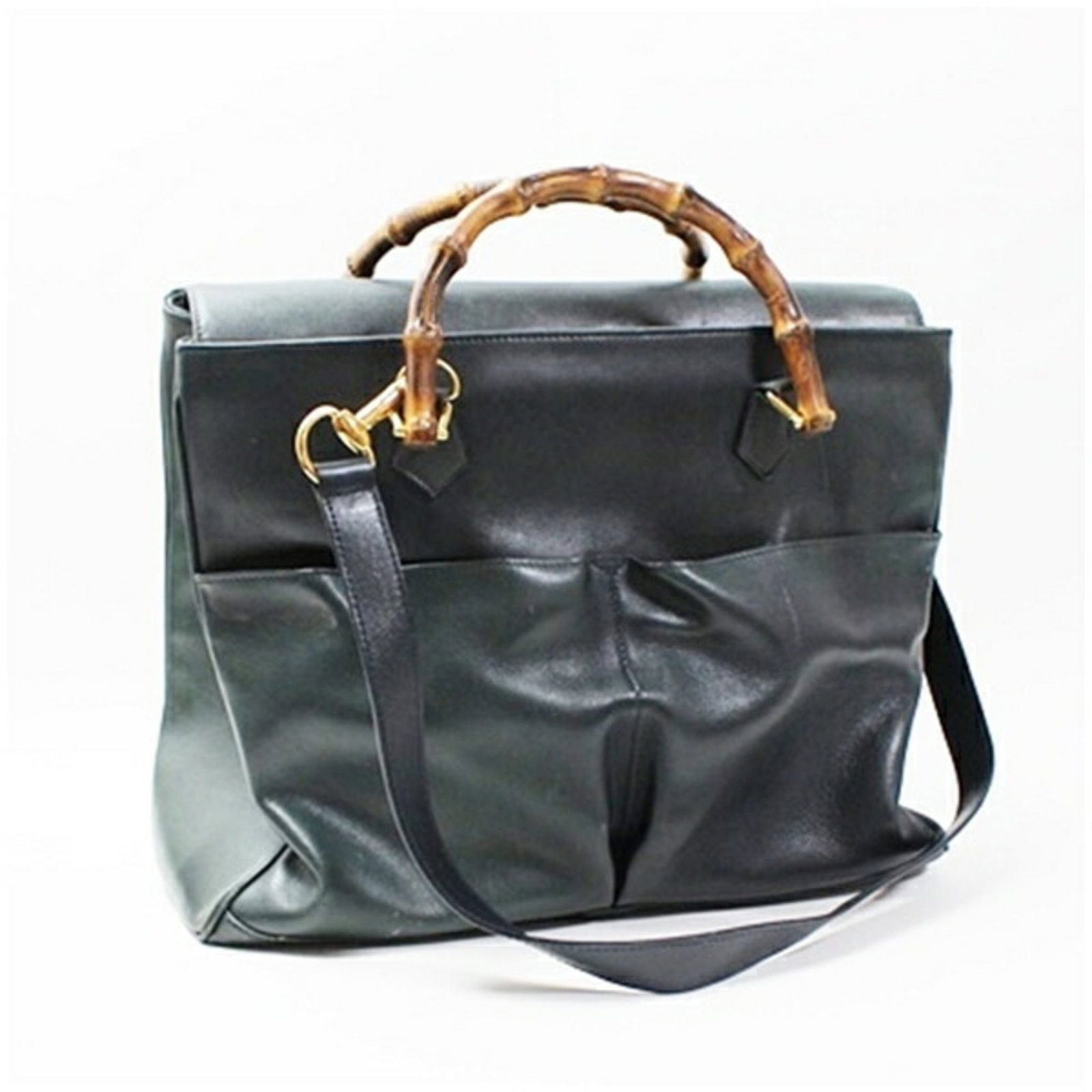 Gucci Tote Bag Leather: Gucci Tote Bag Leather A pre-owned Gucci tote bag in rich, versatile leather - the perfect accessory for everyday style. With its classic design and timeless color palette, this bag is sure to add a