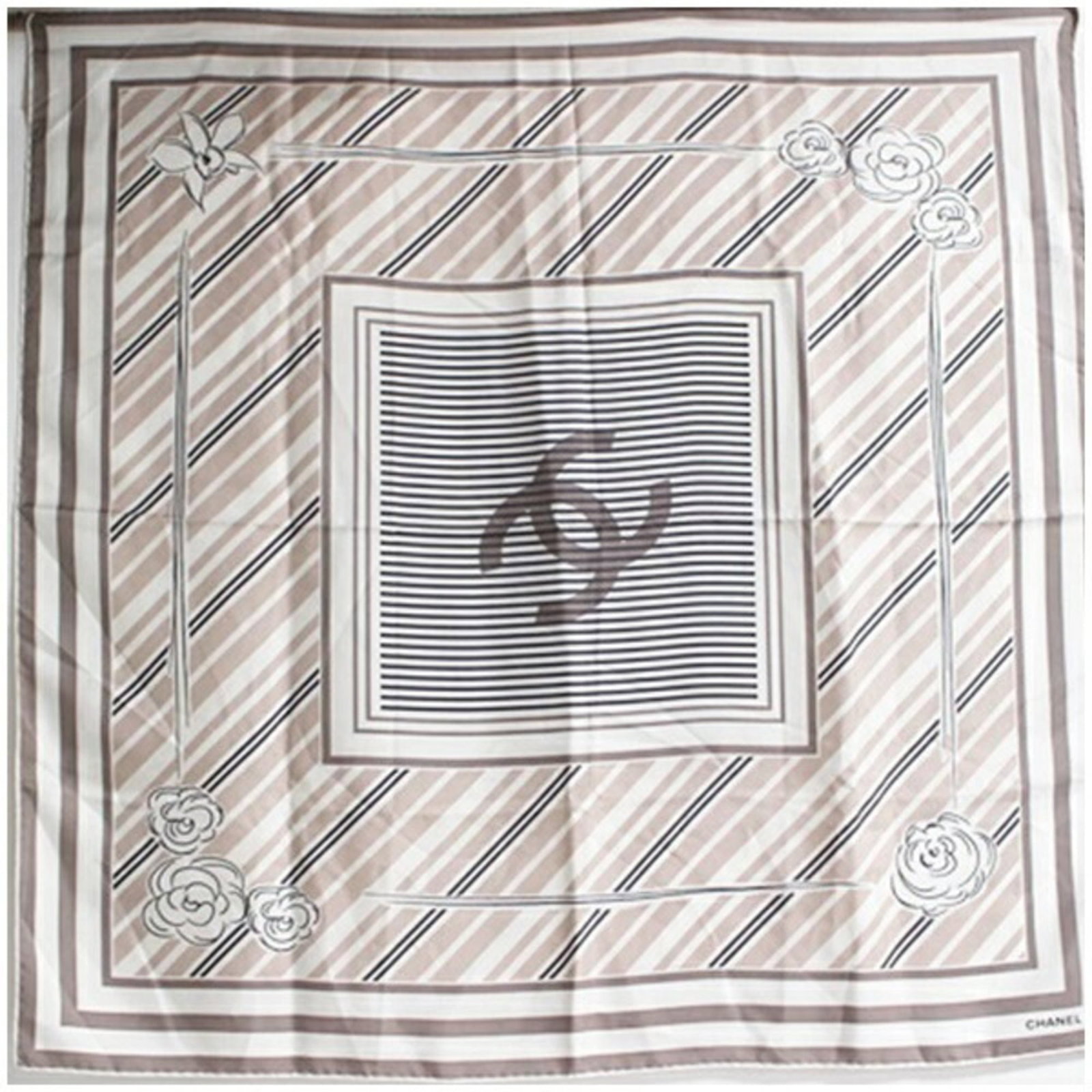 Chanel is a scarf: Chanel is a scarf A pre-owned Chanel scarf in pristine condition, boasting the iconic interlocking CC logo and timeless beige hue that exudes effortless elegance. With its 86cm x 86cm square shape