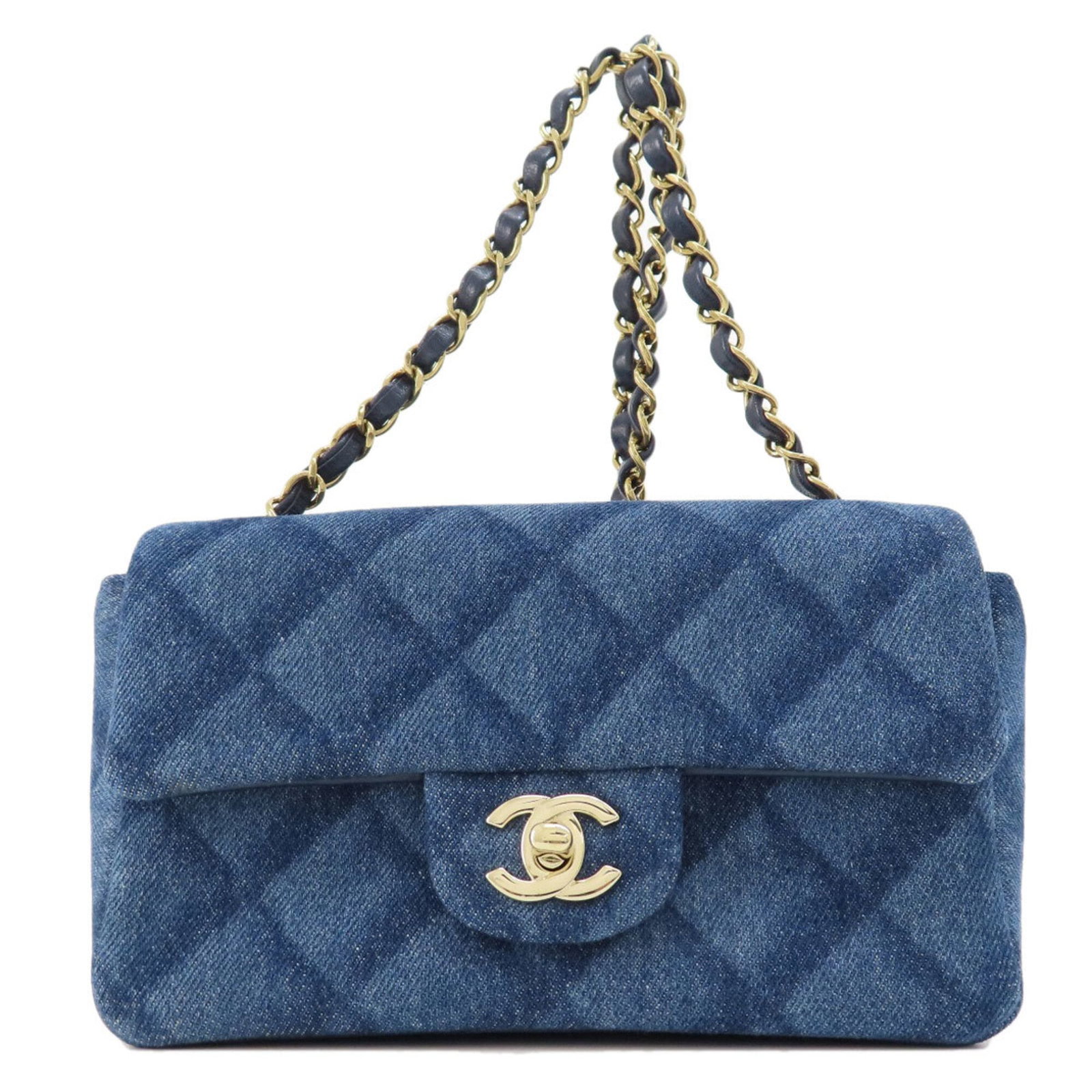 Chanel denim shoulder bag: Chanel denim shoulder bag A chic and timeless piece, this Chanel denim shoulder bag boasts a unique blend of high-end style and casual cool, with its signature turn lock closure and spacious interior