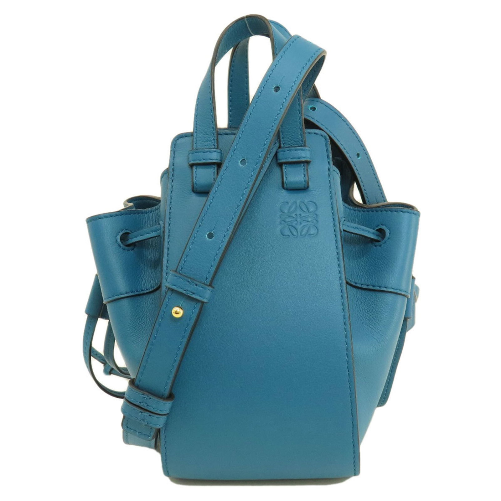 Leather Loewe Handbag: Leather Loewe Handbag A stunning Turquoise Leather Loewe handbag, crafted from rich calfskin and boasting a timeless turquoise hue, adds an air of sophistication to any outfit. With its classic