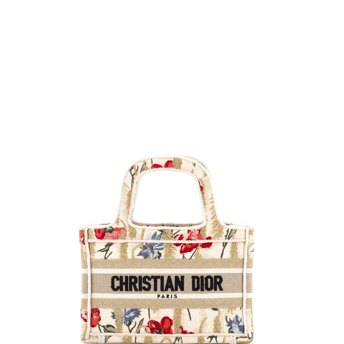 Christian Dior Mini Canvas Tote Embroidered Book: Christian Dior Mini Canvas Tote Embroidered Book A miniature masterpiece from Christian Dior, this embroidered canvas tote book is a stylish and functional accessory for the modern woman on-the-go.