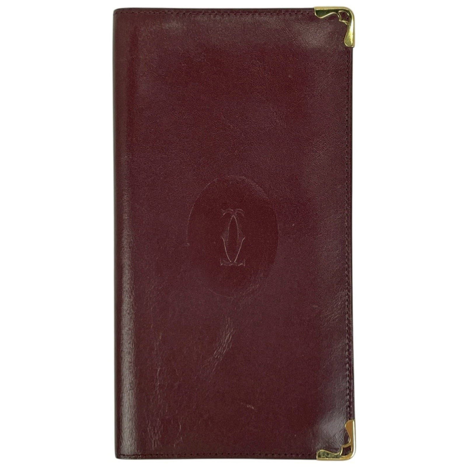 Cartier long leather bi-fold wallet: Cartier long leather bi-fold wallet A stunning Cartier long bi-fold wallet in rich Bordeaux leather, perfect for adding a touch of sophistication to your daily essentials. With its classic design and