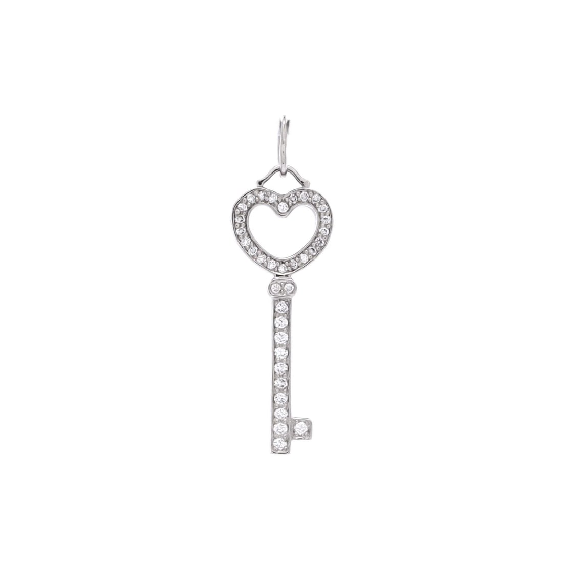 Tiffany & Co. Heart Key Pendant & Charms Platinum with Pave Diamonds: Tiffany & Co. Heart Key Pendant & Charms Platinum with Pave Diamonds Elegant and sophisticated, the Tiffany & Co. Heart Key Pendant is a timeless piece of jewelry that exudes refinement. Set in