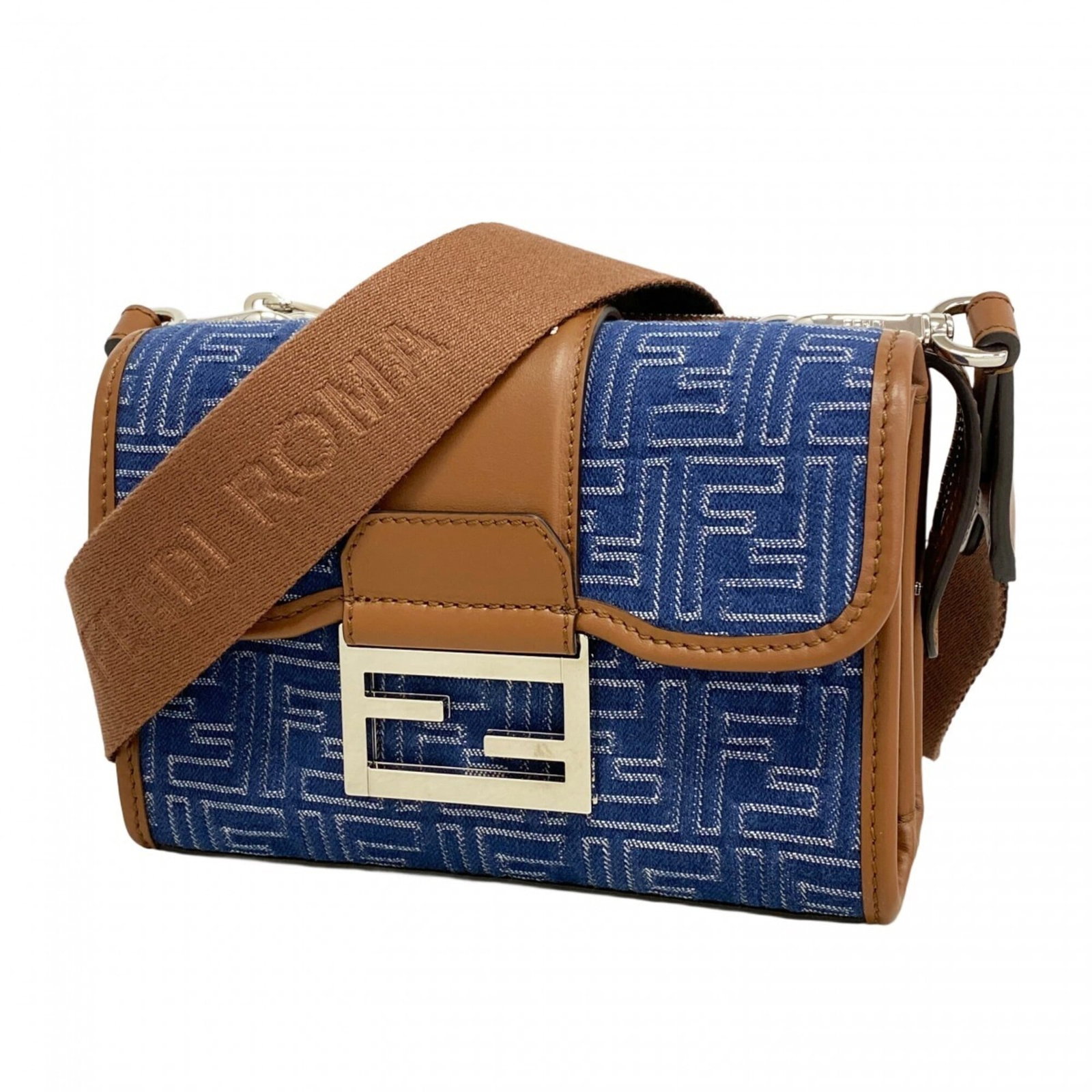 Fendi Shoulder Bag Canvas: Fendi Shoulder Bag Canvas A pre-owned Fendi shoulder bag in a vibrant blue canvas, adorned with sleek silver hardware, adds a touch of sophisticated elegance to any outfit. With its classic design and