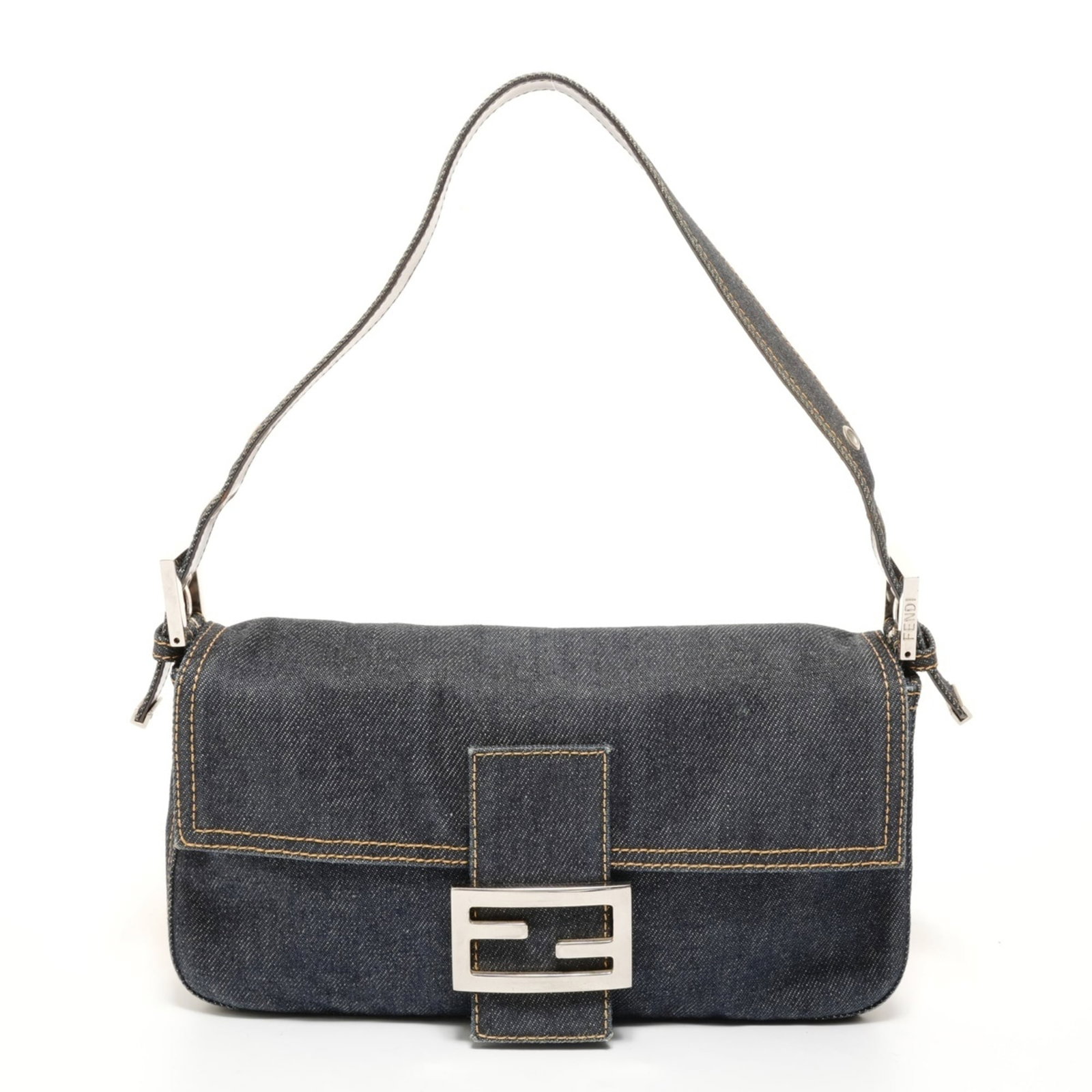 Fendi is a denim shoulder bag.: Fendi is a denim shoulder bag. Elevate your style with the iconic Fendi denim shoulder bag, boasting a classic navy hue and sleek silver hardware. Its spacious interior and adjustable strap make it pe