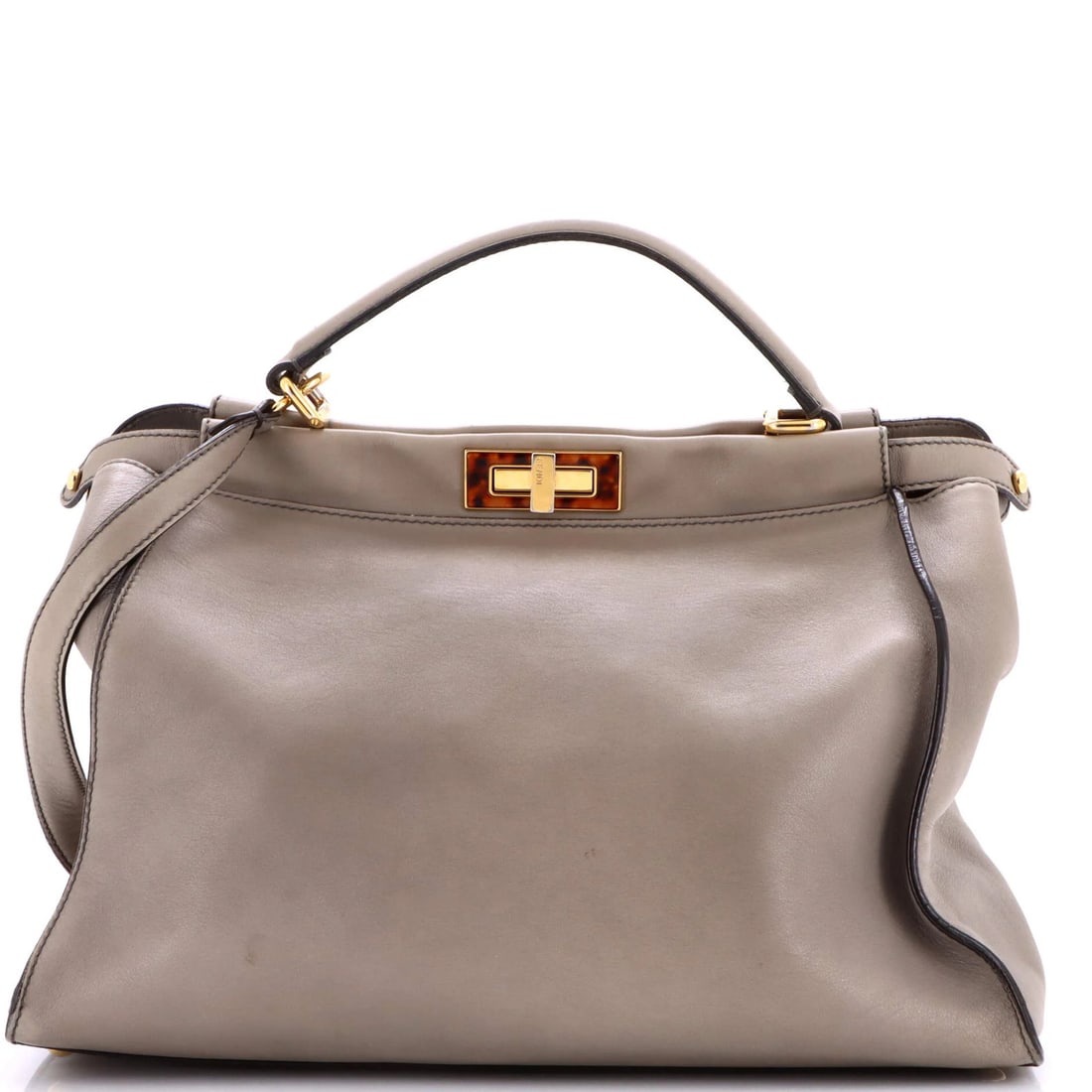 Fendi Large Soft Leather Peekaboo Bag: Fendi Large Soft Leather Peekaboo Bag Experience the epitome of luxury with this iconic Fendi Peekaboo bag, boasting soft leather construction and sleek gold hardware. Its spacious interior is