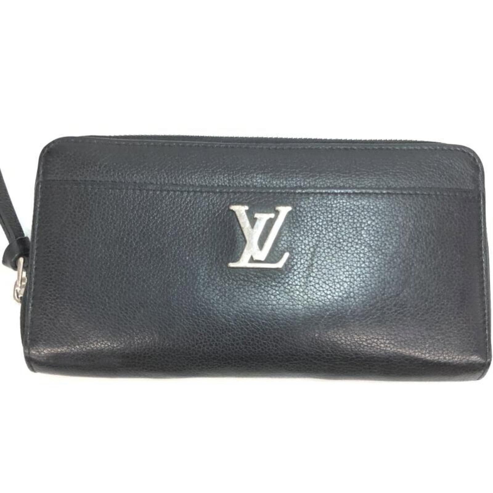 Louis Vuitton leather long bi-fold wallet: Louis Vuitton leather long bi-fold wallet A sleek and sophisticated Louis Vuitton bi-fold wallet, crafted from high-quality black leather, boasts classic design with clean lines and timeless