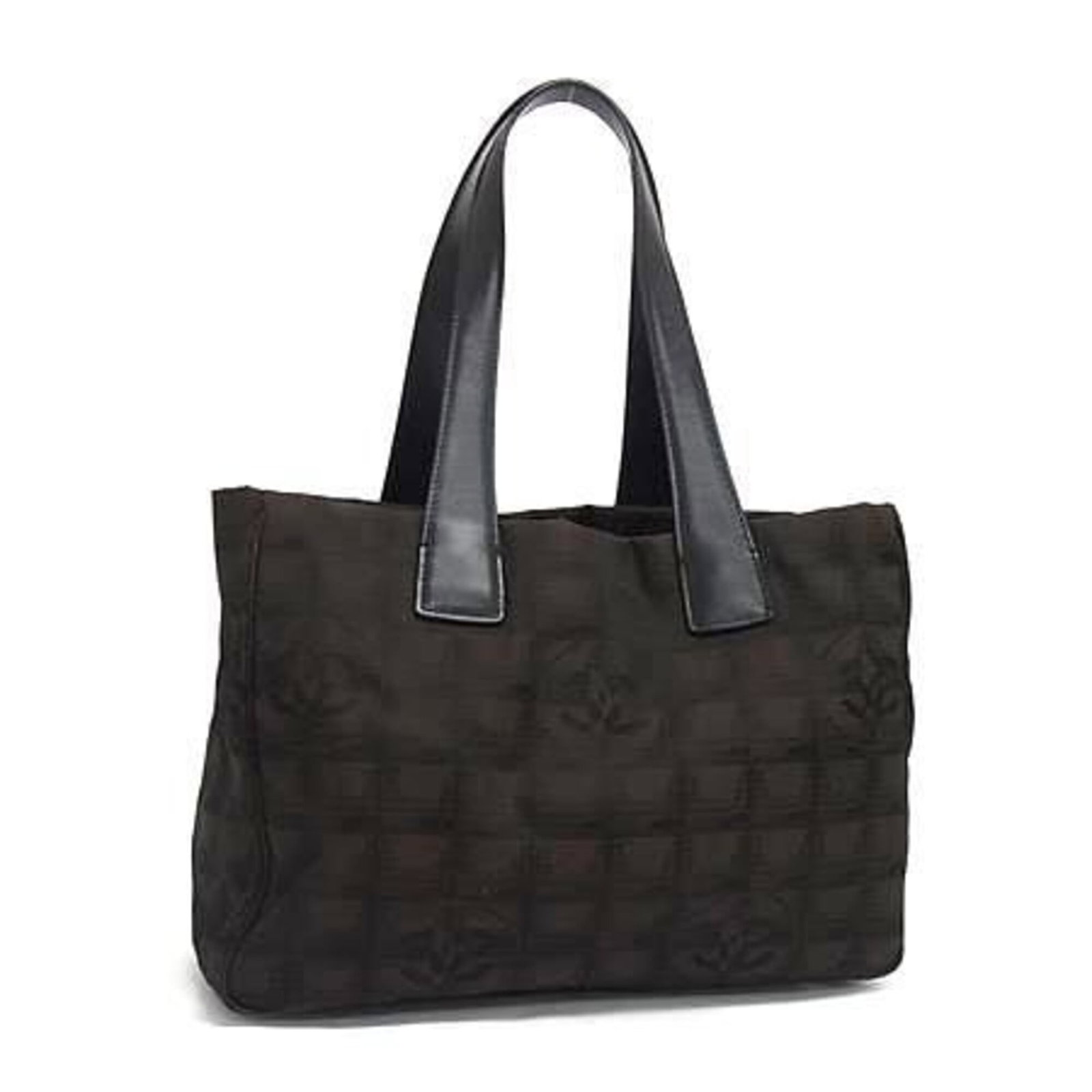 Chanel Handbag, Tote Bag Nylon, Leather: Chanel Handbag, Tote Bag Nylon, Leather A timeless Chanel tote in sleek black and rich brown, crafted from durable nylon and supple leather. With its classic design and versatile size, this bag is per
