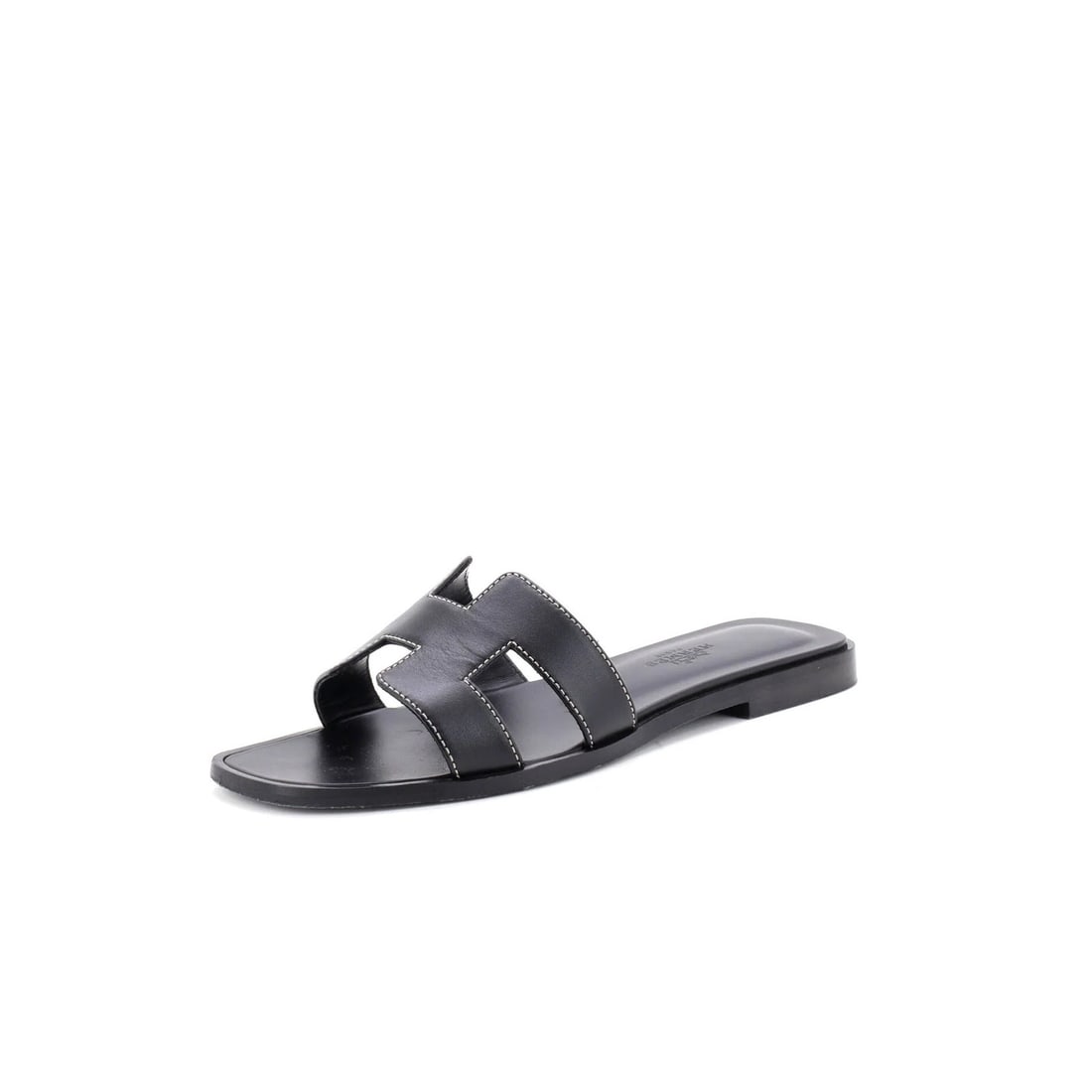 Hermes women's leather sandals.: Hermes women's leather sandals. Elevate your summer style with the iconic Hermes Oran sandals, boasting sleek black leather exterior and interior details that exude timeless sophistication. With its