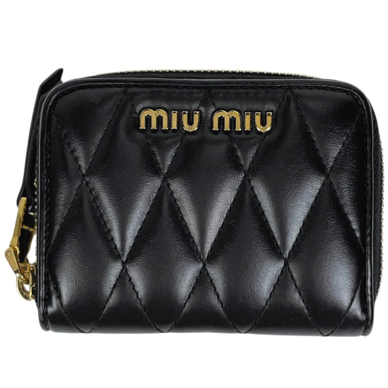 Leather card case by Miu: Leather card case by Miu Elevate your everyday essentials with this sleek Miu Miu leather card case, crafted from rich black leather that exudes sophistication and elegance. With its classic design