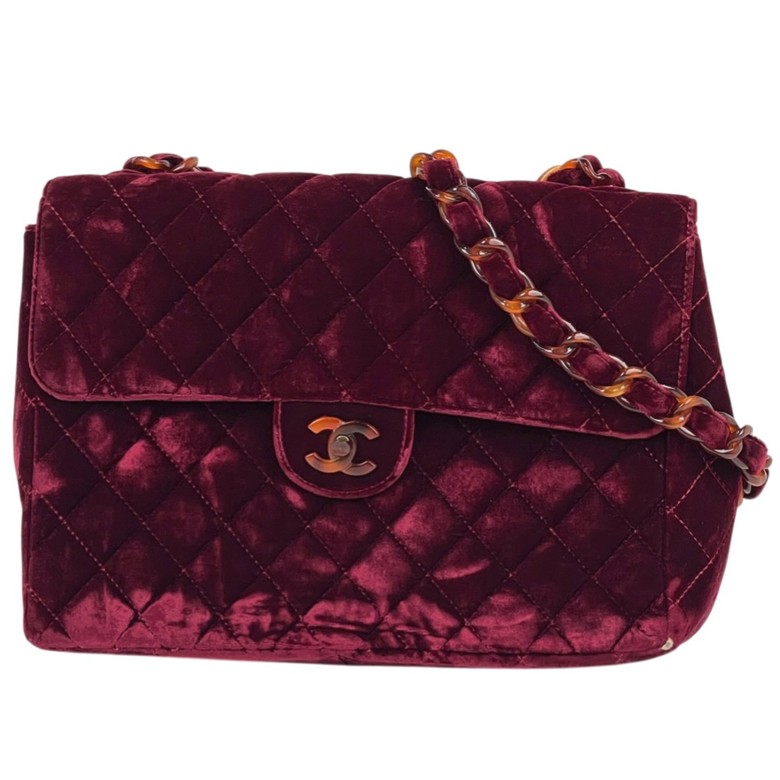 Chanel velvet shoulder bag: Chanel velvet shoulder bag Experience the timeless elegance of Chanel's iconic velvet shoulder bag, boasting a rich Bordeaux hue that adds sophistication to any outfit. With its classic design and lux