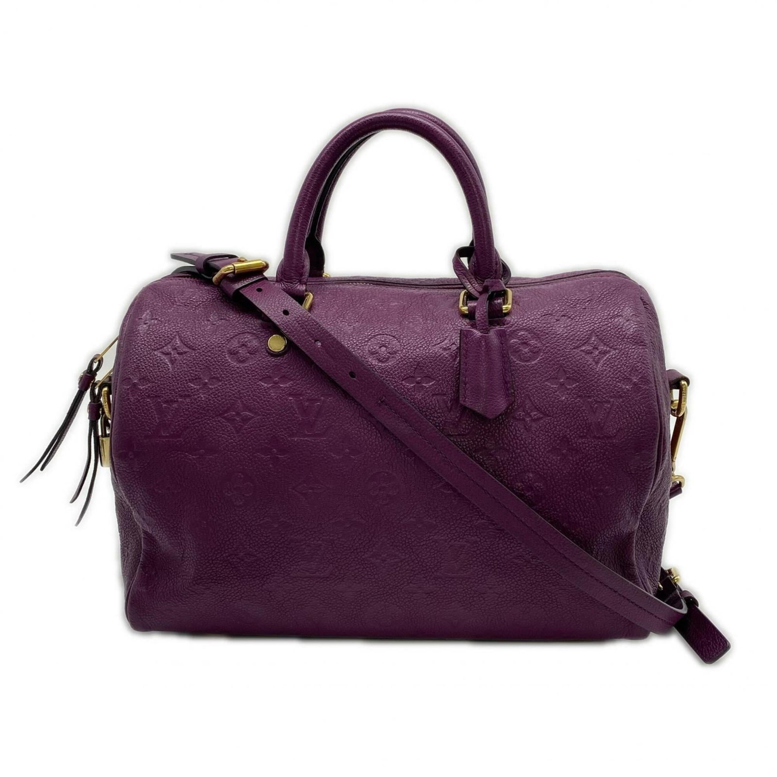 Louis Vuitton Leather Handbag: Louis Vuitton Leather Handbag A stunning Louis Vuitton leather handbag in rich purple hue, boasting classic monogram pattern and premium calf leather construction. With its sturdy zipper closure,
