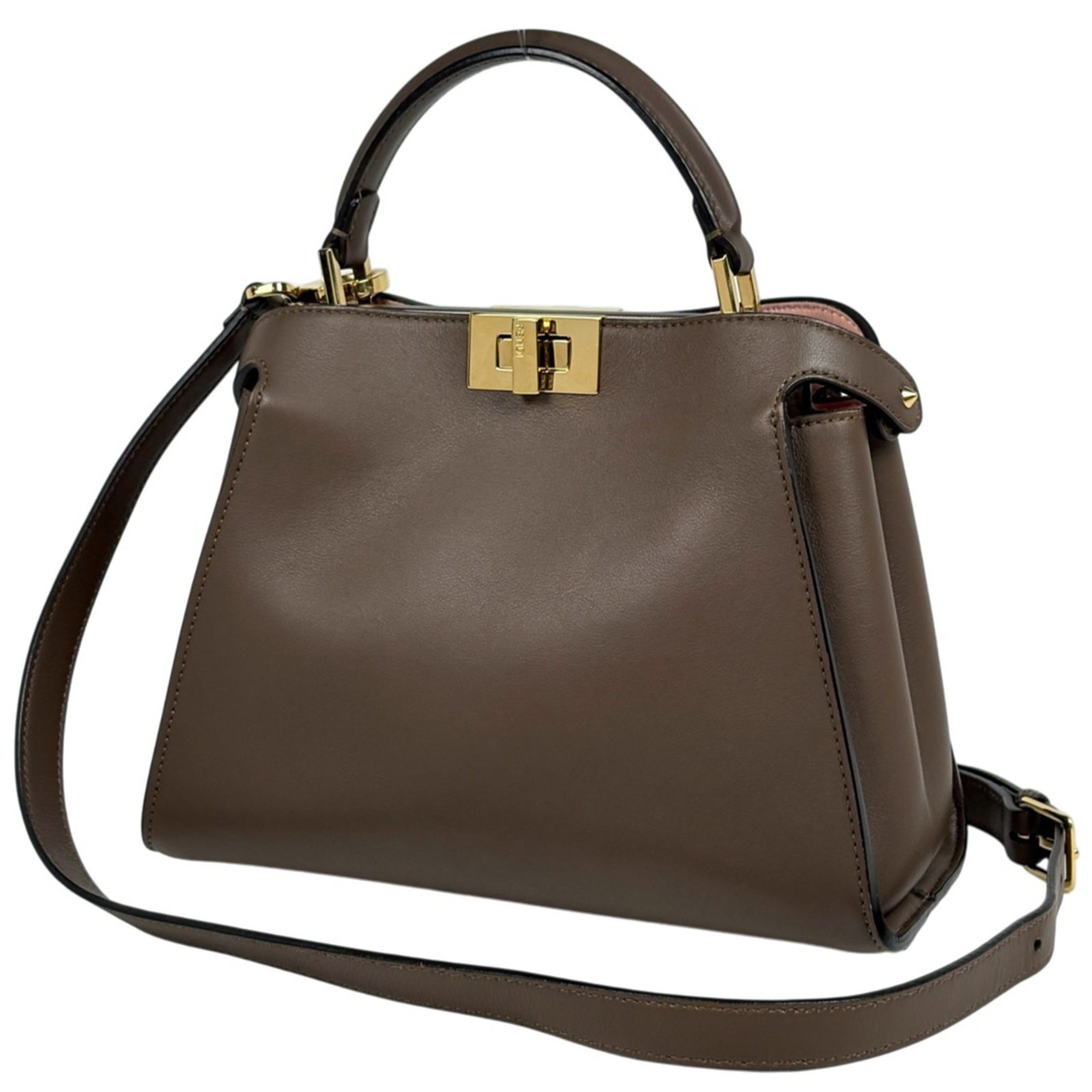 Fendi Leather Shoulder Bag: Fendi Leather Shoulder Bag A classic Fendi leather shoulder bag, this timeless piece boasts rich brown leather and clean lines that exude sophistication. With its spacious interior and sturdy design,