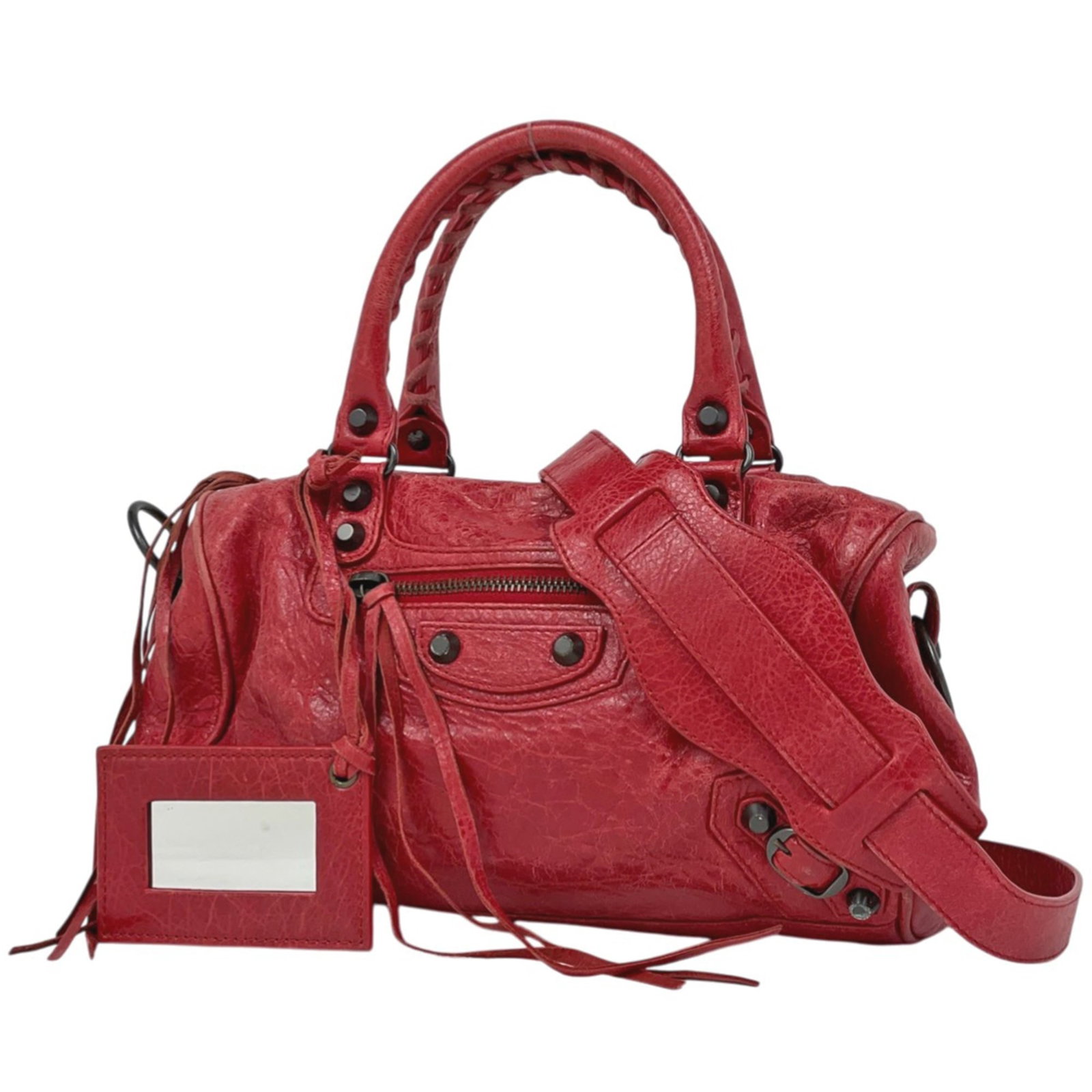 Leather shoulder bag by Balenciaga: Leather shoulder bag by Balenciaga A vibrant red Balenciaga leather shoulder bag, with its sleek 15cm x 24cm silhouette, adds a pop of color to any outfit. With its premium leather construction and