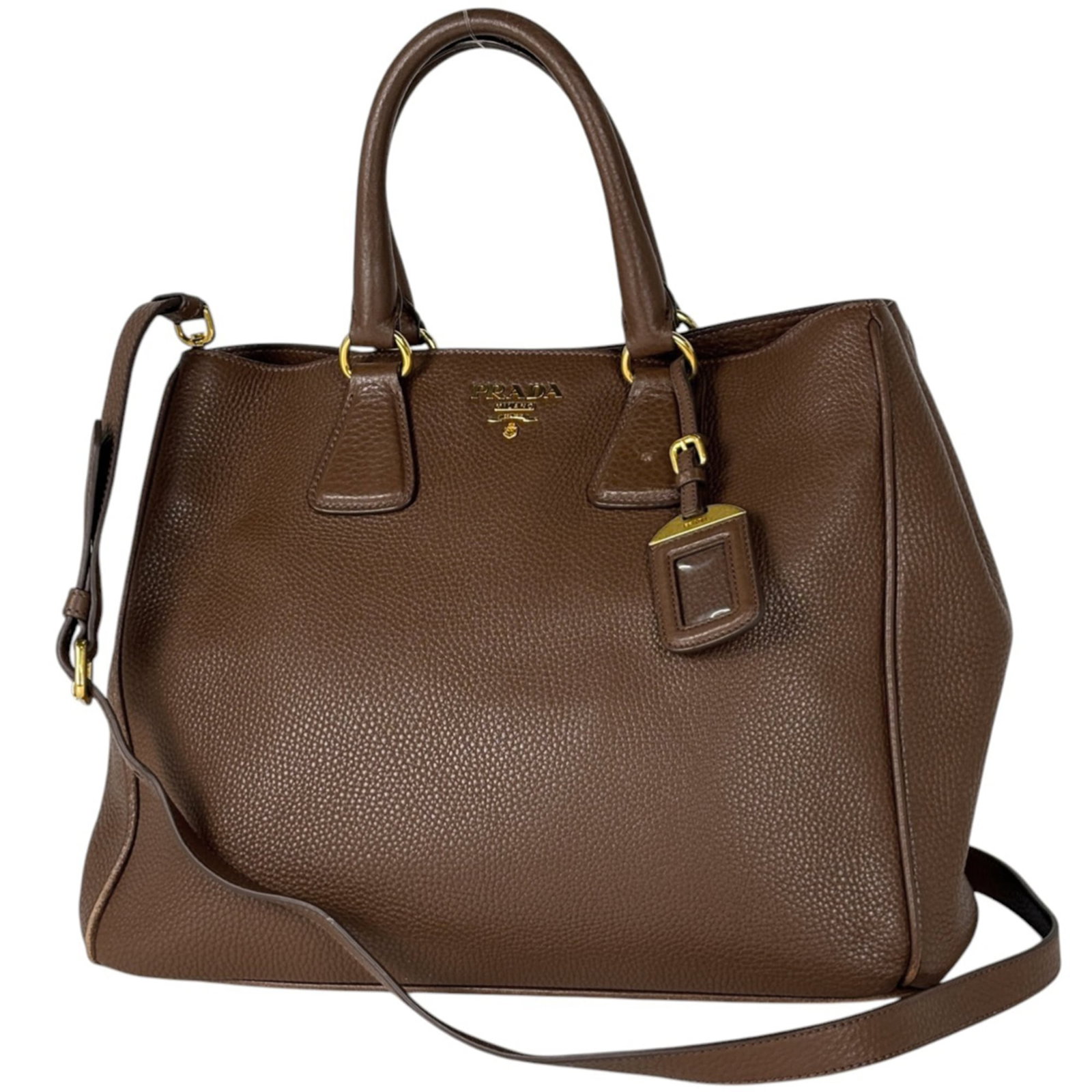 Prada Handbag, Shoulder Bag, Tote Bag Leather: Prada Handbag, Shoulder Bag, Tote Bag Leather A timeless Prada shoulder bag in rich brown leather, perfect for adding a touch of sophistication to any outfit. With its classic design and sturdy