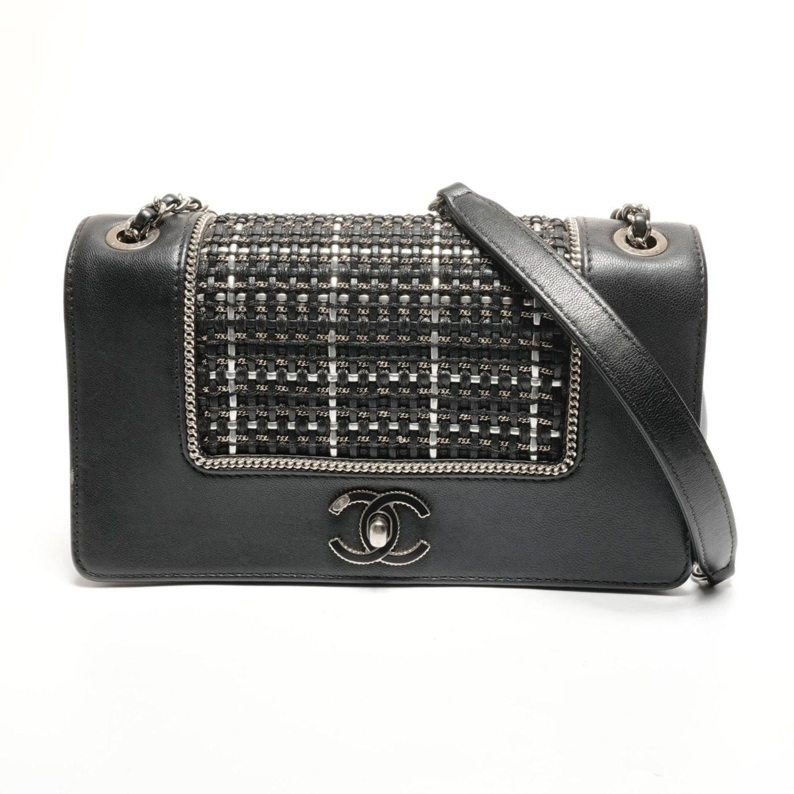 Chanel Leather Shoulder Bag: Chanel Leather Shoulder Bag A timeless and sophisticated Chanel leather shoulder bag, crafted from luxurious lambskin in sleek black. With its classic design and spacious interior, this iconic bag is