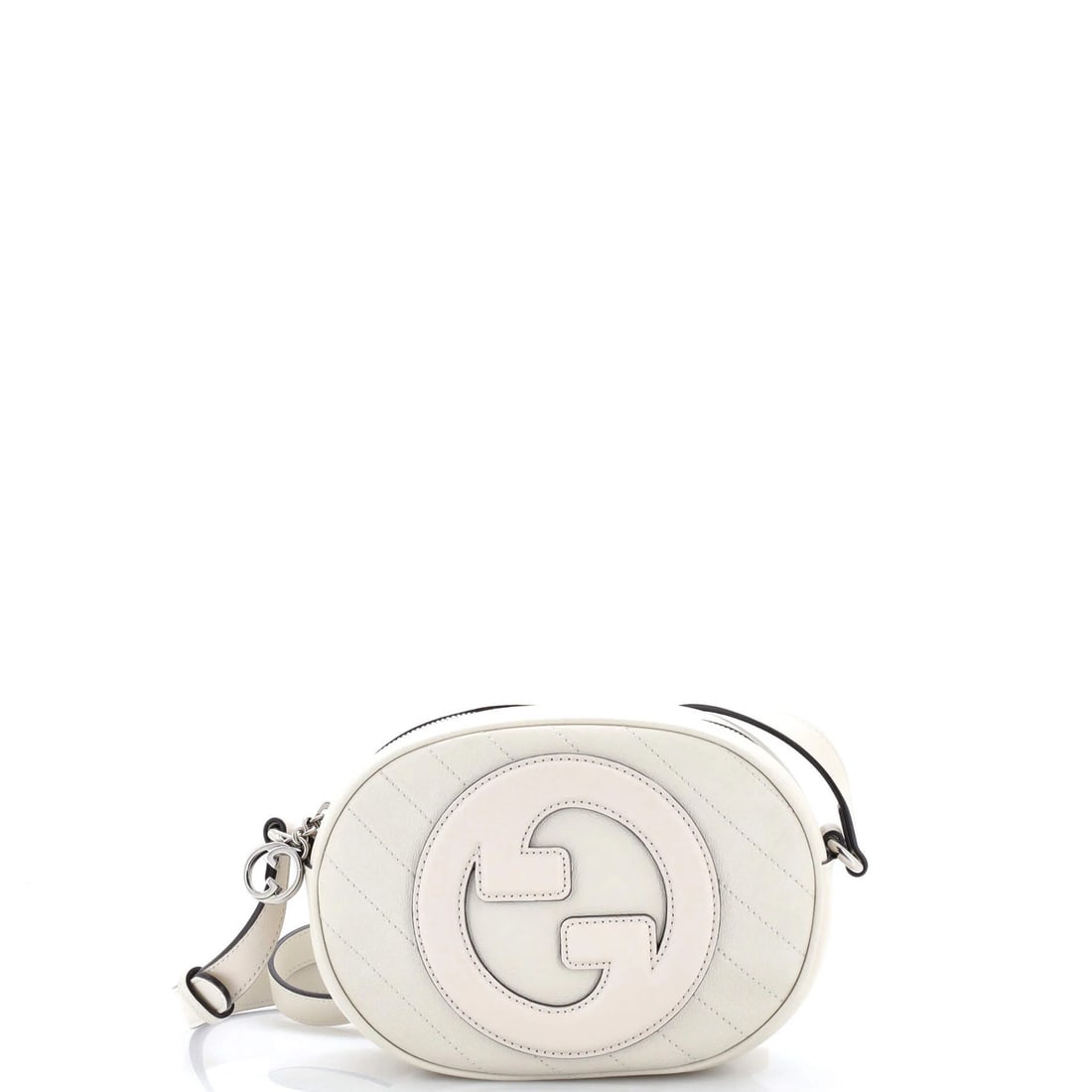 Gucci camera bag quilted leather diagonal round: Gucci camera bag quilted leather diagonal round A stylish and functional Gucci camera bag, perfect for the photographer on-the-go, boasts a classic quilted leather exterior with a neutral tone that pa