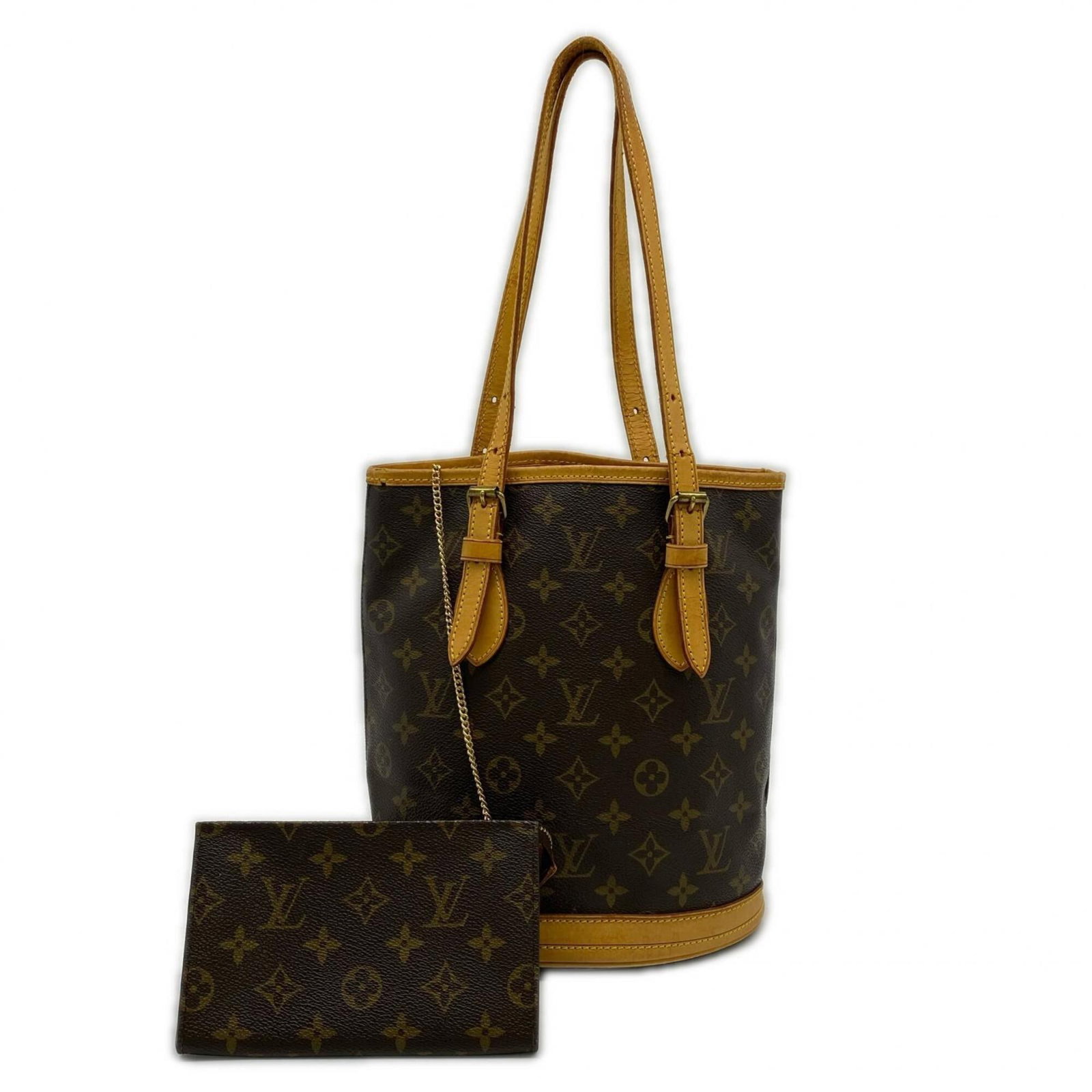 Louis Vuitton Coated Canvas Leather Handbag: Louis Vuitton Coated Canvas Leather Handbag A timeless piece from the iconic Louis Vuitton brand, this brown coated canvas leather handbag boasts classic style with a touch of luxury. With its