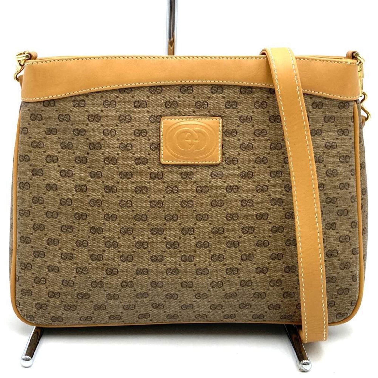 Gucci Shoulder Bag Pvc, Leather: Gucci Shoulder Bag Pvc, Leather A chic and timeless Gucci shoulder bag, this Pvc and leather brown beauty boasts sleek lines and classic style that's perfect for adding an air of sophistication to