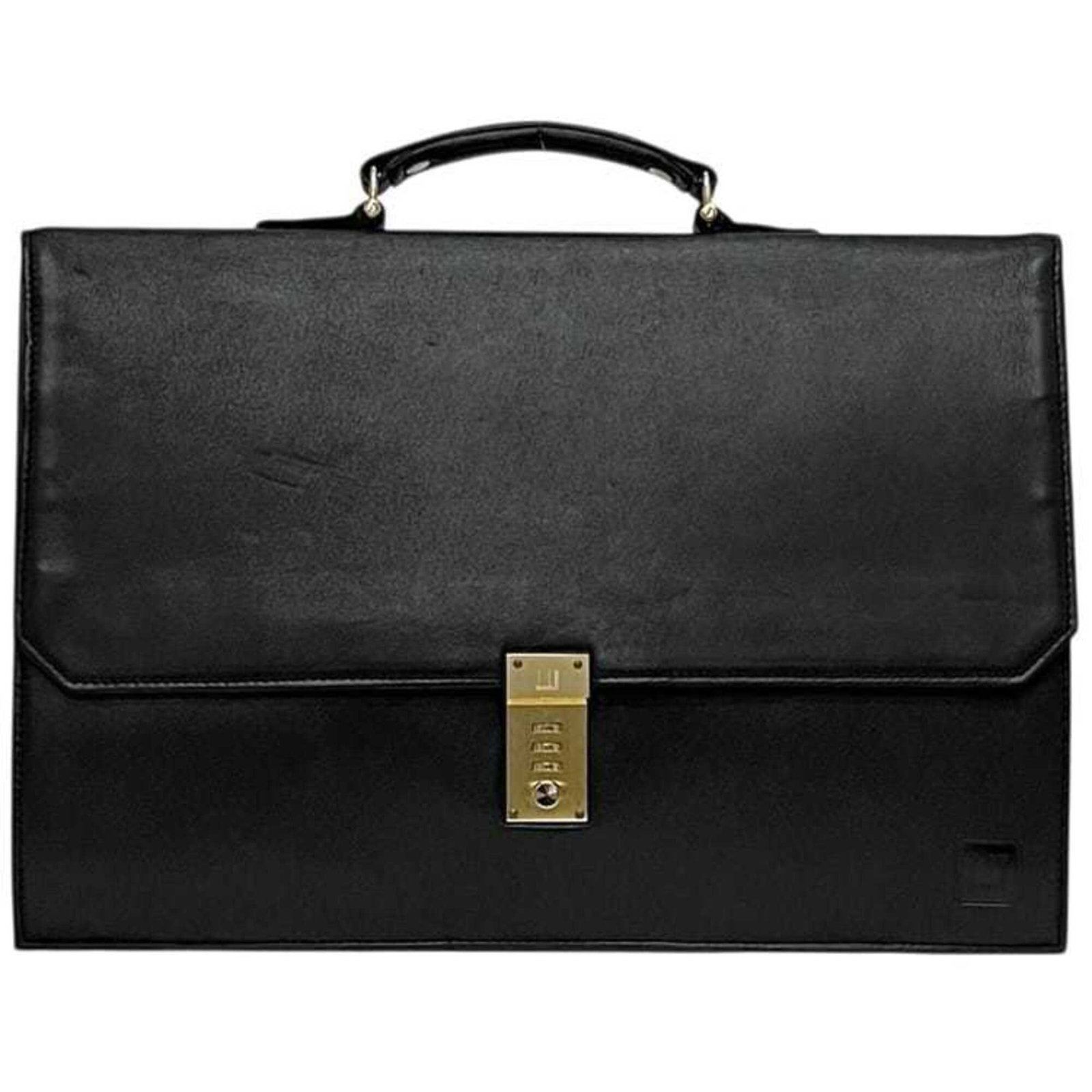 Dunhill is a leather briefcase: Dunhill is a leather briefcase A classic Dunhill briefcase in pristine condition, despite its age, boasts sleek black leather and timeless design that exudes sophistication. Its compact size makes it