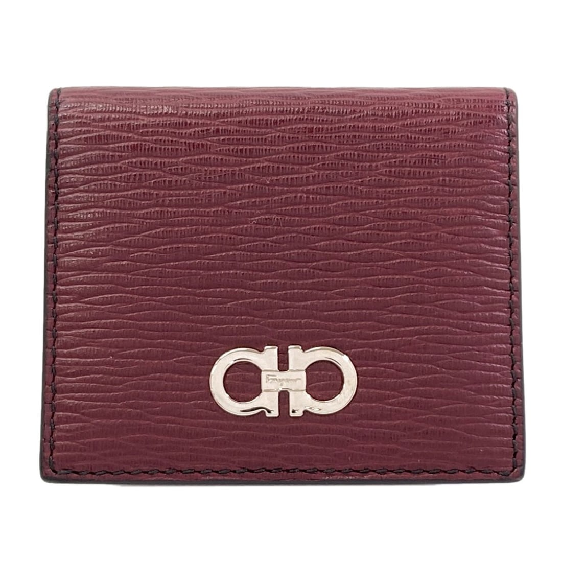 Salvatore Ferragamo GanciniHardware coin purse Leather: Salvatore Ferragamo GanciniHardware coin purse Leather Elevate your everyday style with the iconic Salvatore Ferragamo GanciniHardware coin purse, crafted from rich Bordeaux leather and adorned with s