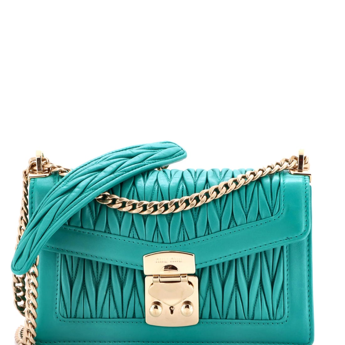 Miu Flap Lock Shoulder Bag Matelasse Leather Medium: Miu Flap Lock Shoulder Bag Matelasse Leather Medium Elevate your style with the Miu Miu Flap Lock Shoulder Bag, crafted from luxurious matelasse leather in a stunning green hue. This medium-sized bag