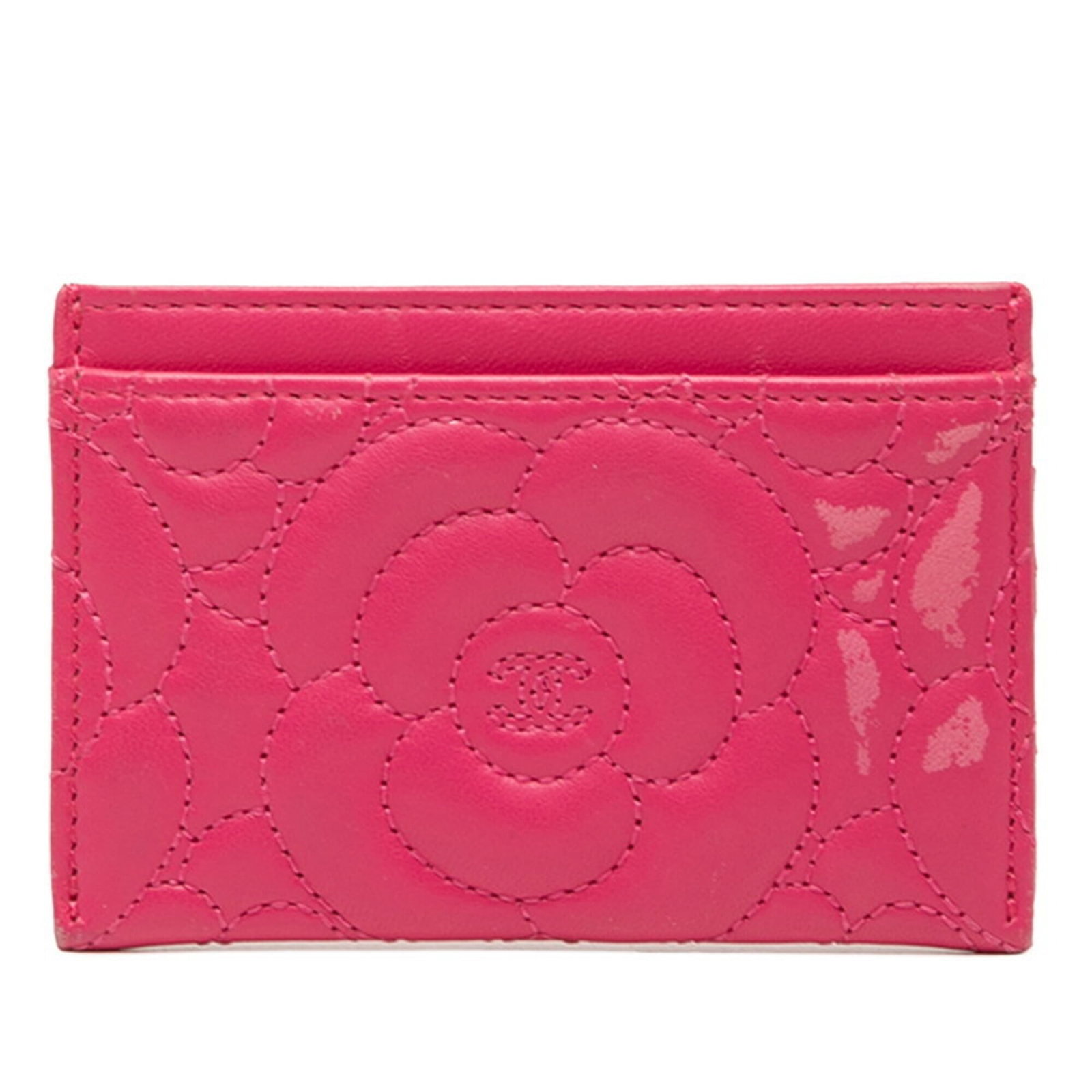 Leather card case from Chanel: Leather card case from Chanel A chic and timeless piece, this Chanel lambskin card case exudes elegance with its soft pink hue and premium leather construction. With its classic design and subtle