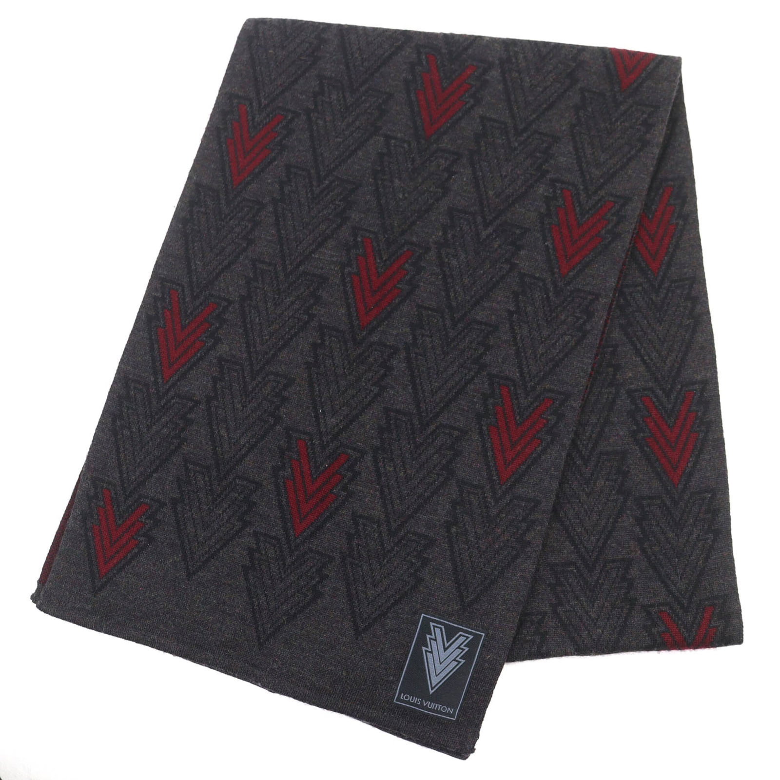 Louis Vuitton is a stole of wool.: Louis Vuitton is a stole of wool. A luxurious touch for any man, this Louis Vuitton wool stole boasts the iconic brand's signature craftsmanship and timeless Bordeaux color, evoking elegance and