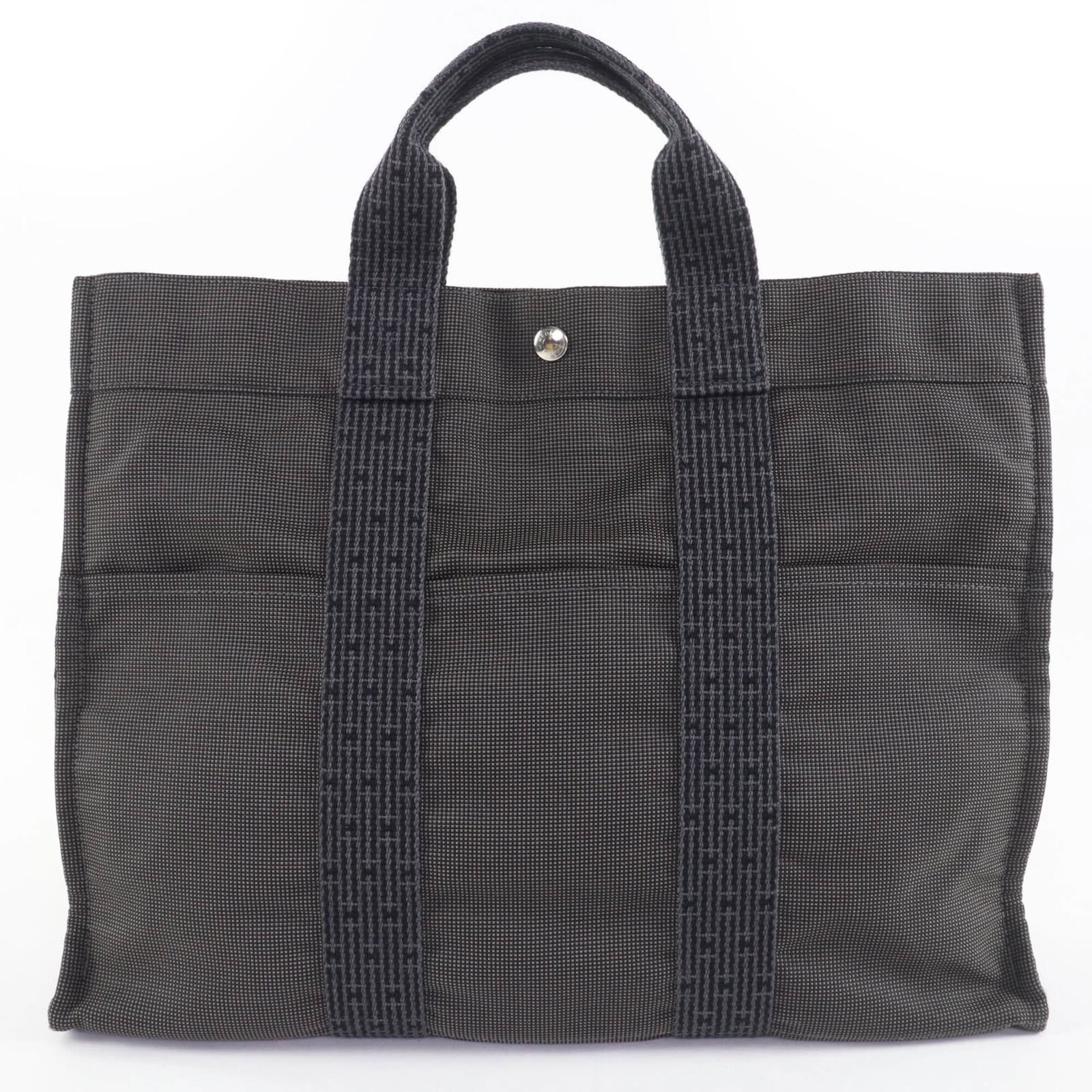 Hermes Handbag, Tote Bag Polyamide, Polyester: Hermes Handbag, Tote Bag Polyamide, Polyester A stunning pre-owned Hermes tote bag in sleek gray, crafted from durable polyamide and polyester materials. With its classic design and timeless appeal,