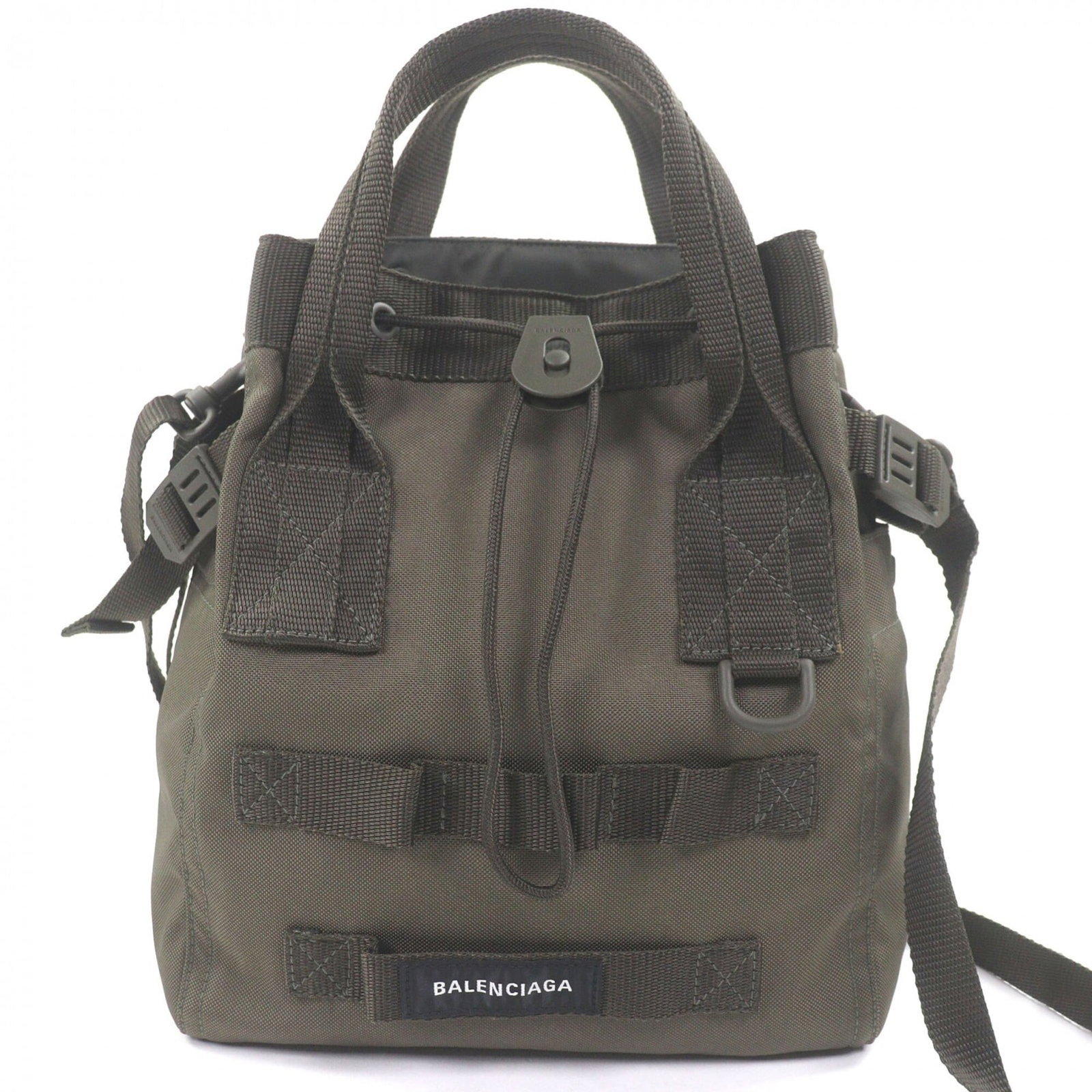 Balenciaga is a polyamide shoulder bag.: Balenciaga is a polyamide shoulder bag. A pre-owned Balenciaga shoulder bag in khaki, crafted from durable polyamide material, boasts a sleek and modern design with clean lines and minimal scratches