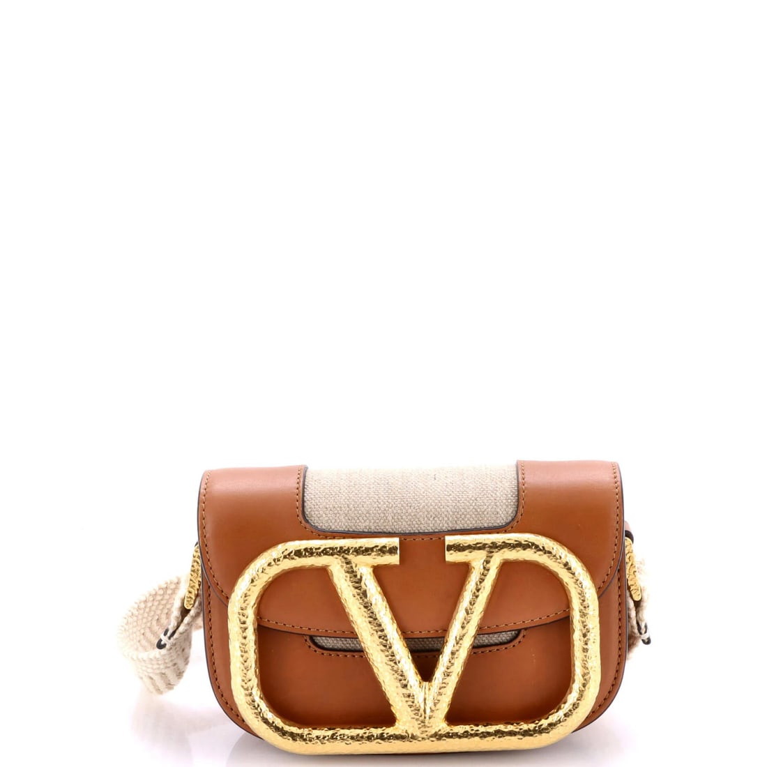 Valentino Garavani Crossbody Bag Linen Leather Small: Valentino Garavani Crossbody Bag Linen Leather Small Elevate your everyday style with the iconic Valentino Garavani Crossbody Bag, crafted from luxurious linen and supple leather. The classic design
