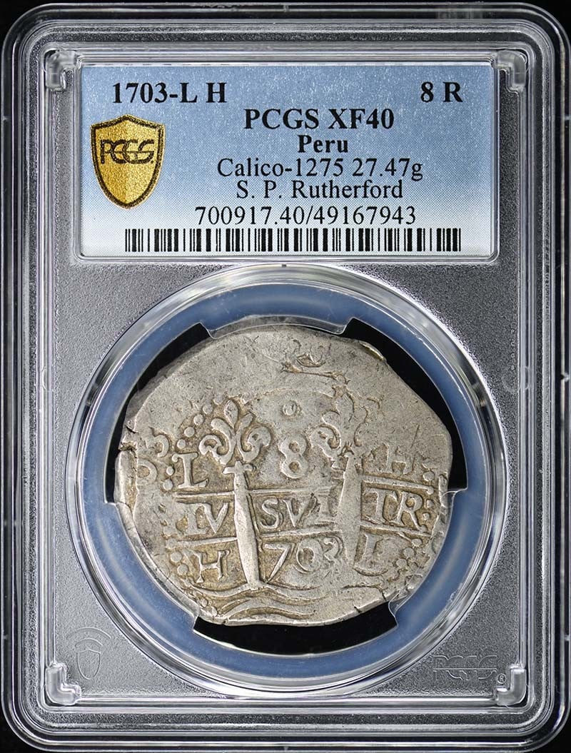 Peru Rutherford Calico 8 R 1703 L PCGS XF40 27.47g: Peru Rutherford Calico 8 R 1703 L PCGS XF40 27.47g A rare and beautiful piece of Peruvian history, the 1703 Rutherford Calico coin is a stunning example of circulated silver from one of South America'