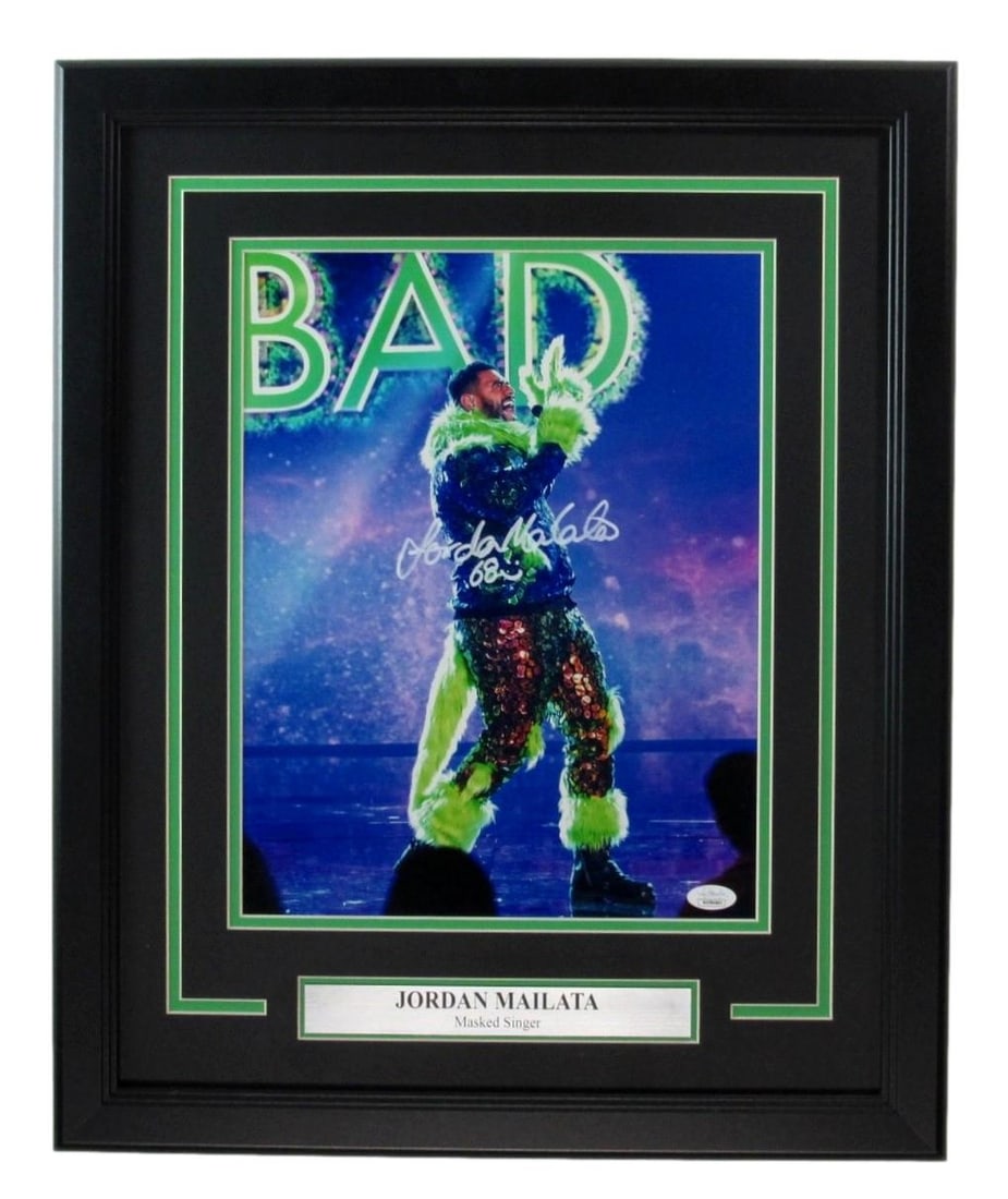 Eagles Framed 11x14 Photo Masked Singer Signed By Jordan Mailata.: Eagles Framed 11x14 Photo Masked Singer Signed By Jordan Mailata. Meet the ultimate football fan's dream! This unique 11x14 photo of Eagles players, including Jordan Mailata, is signed by him and