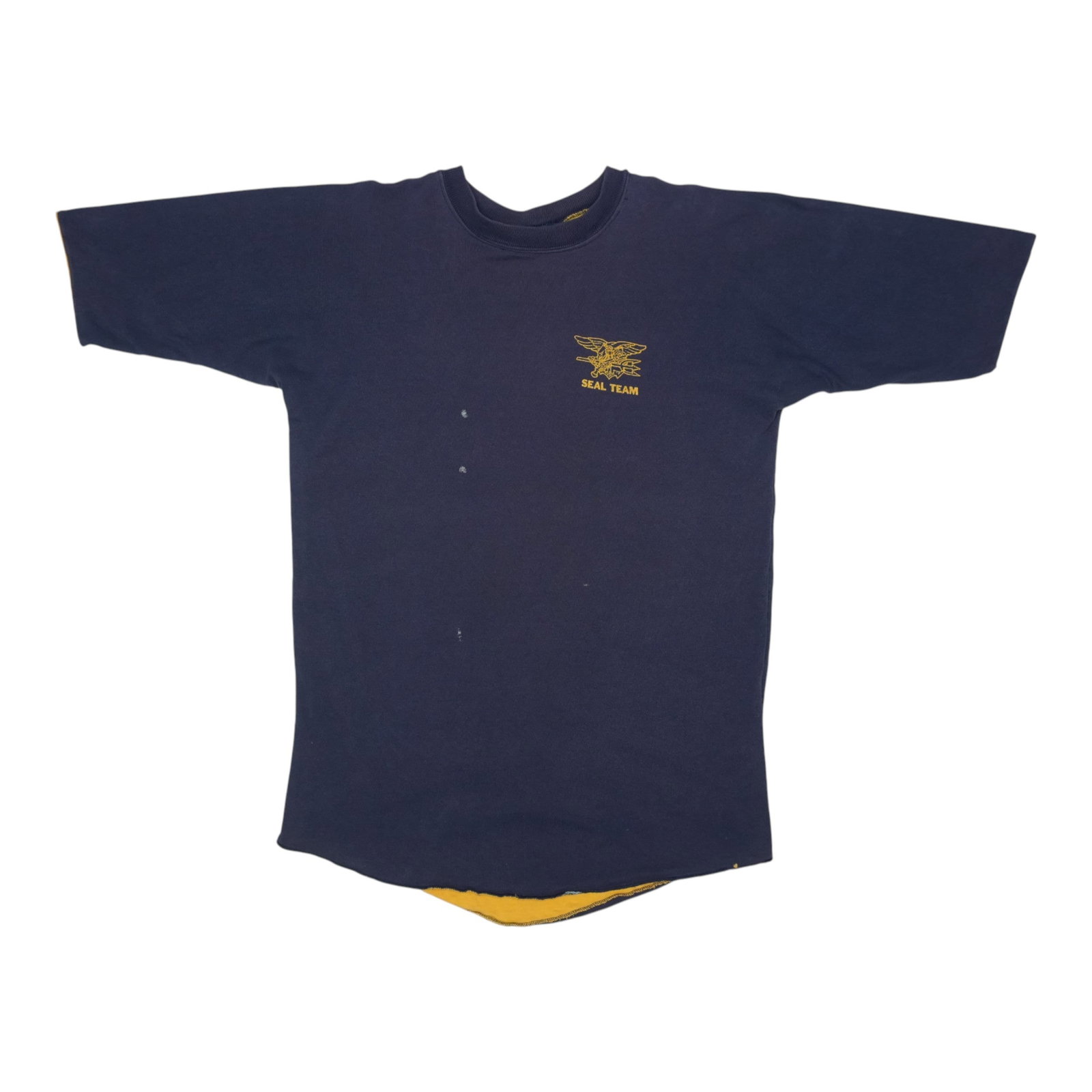 Navy Seal Team Reversible Shirt of 1970s: Navy Seal Team Reversible Shirt of 1970s Get ready to channel your inner 1970s Navy SEAL with this authentic, vintage reversible shirt. Made from 100% cotton and measuring 20 inches pit-to-pit, this c