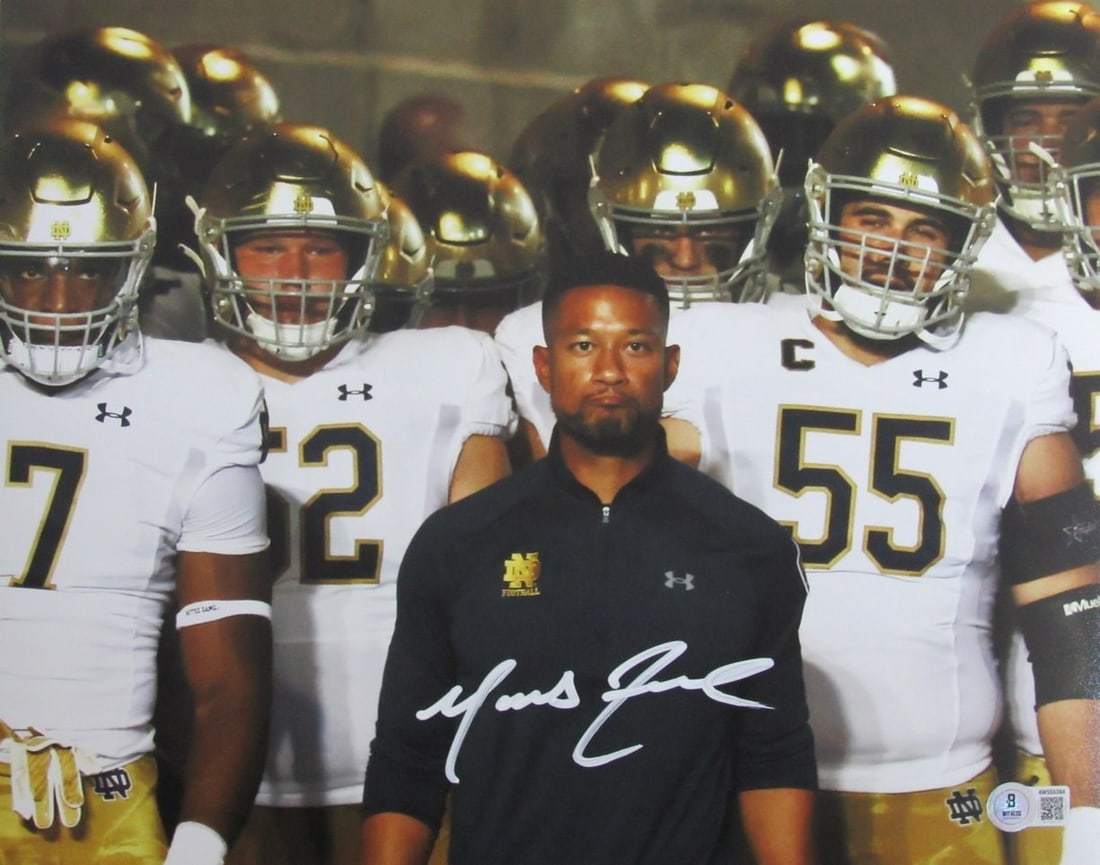 Notre Dame signed photo by coach Marcus Freeman 11x14 from Beckett.: Notre Dame signed photo by coach Marcus Freeman 11x14 from Beckett. Get ready to show off your Notre Dame pride with an authentic 11x14 signed photo of Coach Marcus Freeman, authenticated by the