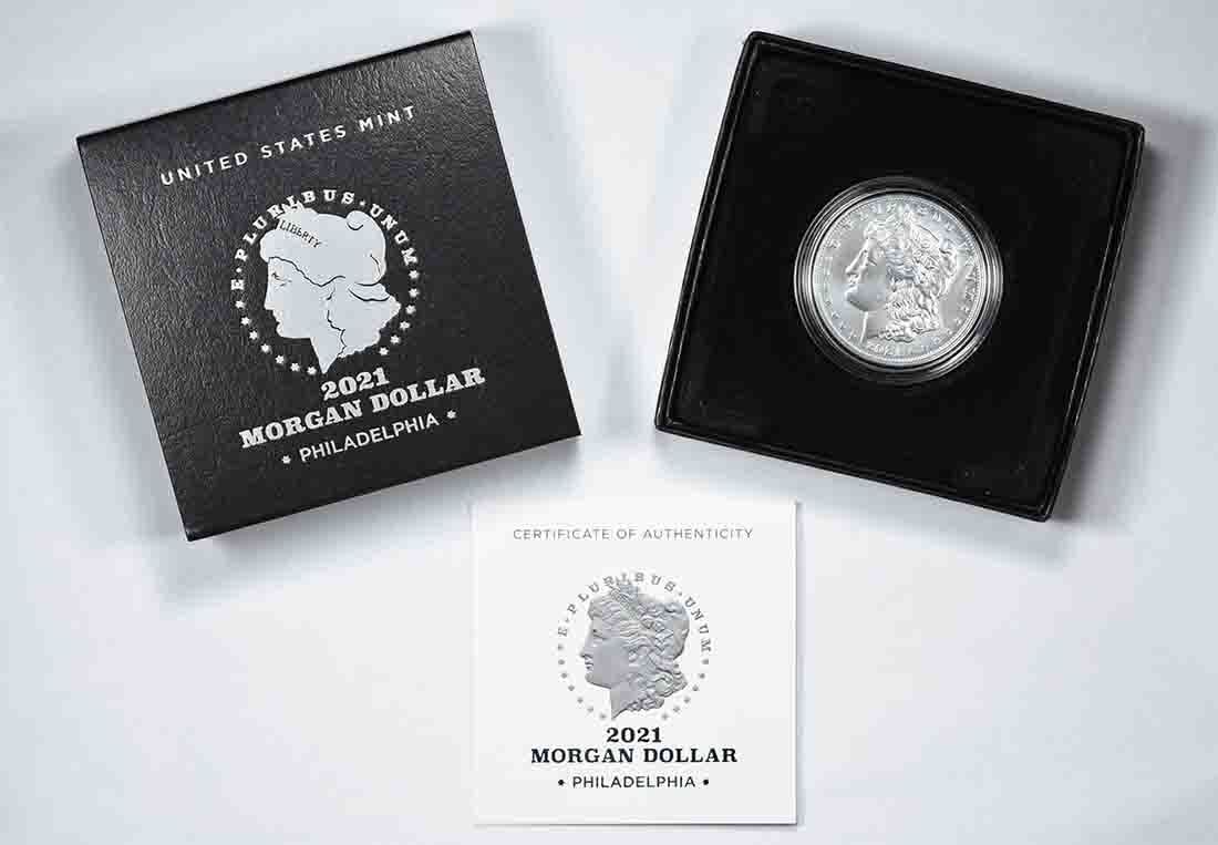 Morgan Silver Dollar in Original Government Packaging: Morgan Silver Dollar in Original Government Packaging A rare opportunity to own a 2021 Morgan Silver Dollar in its original government packaging, certified as uncirculated and minted at the Philadelph